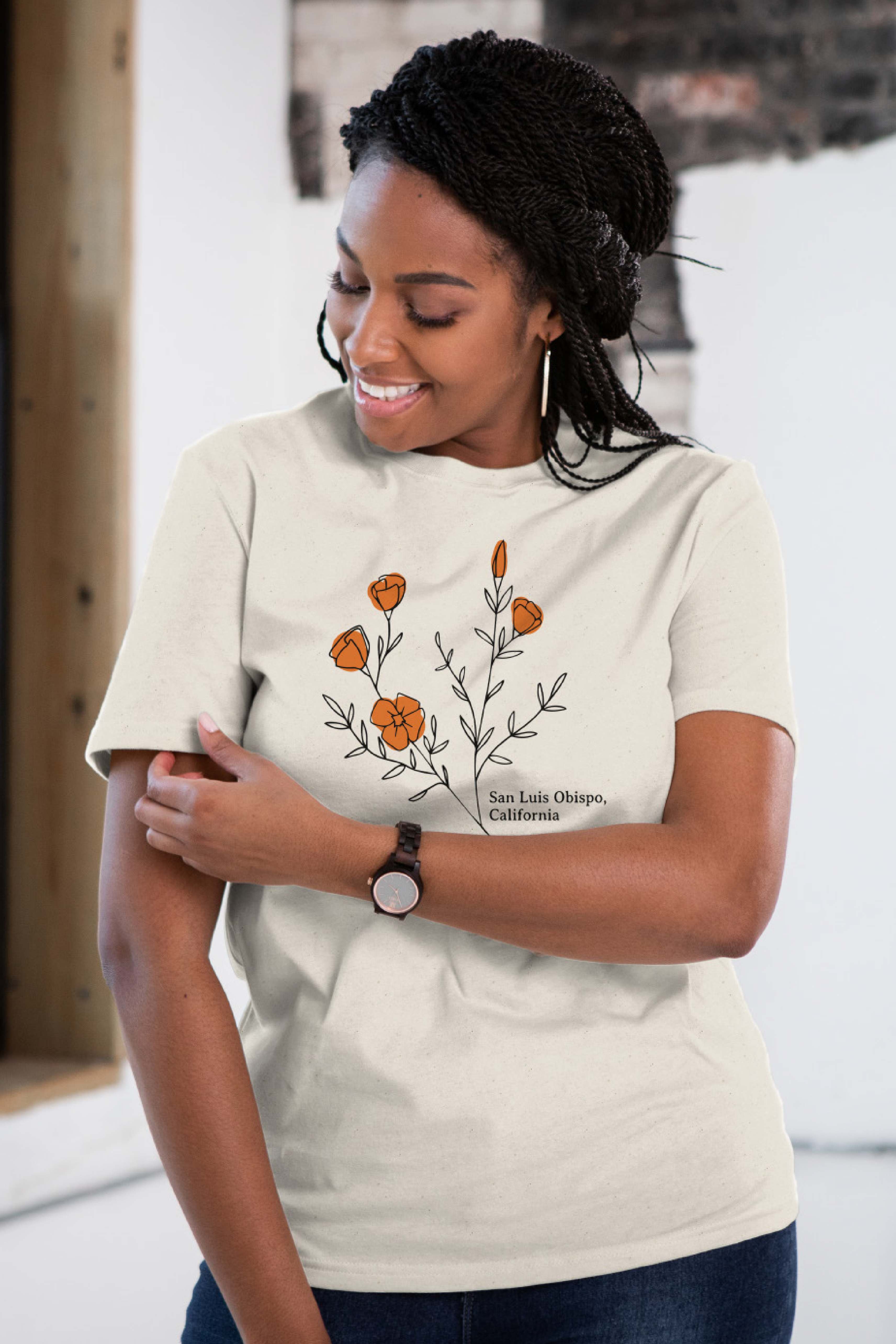 Female Model wearing GOEX Men&#39;s and Unisex Eco Cotton Tee in Ivory with Custom Graphic