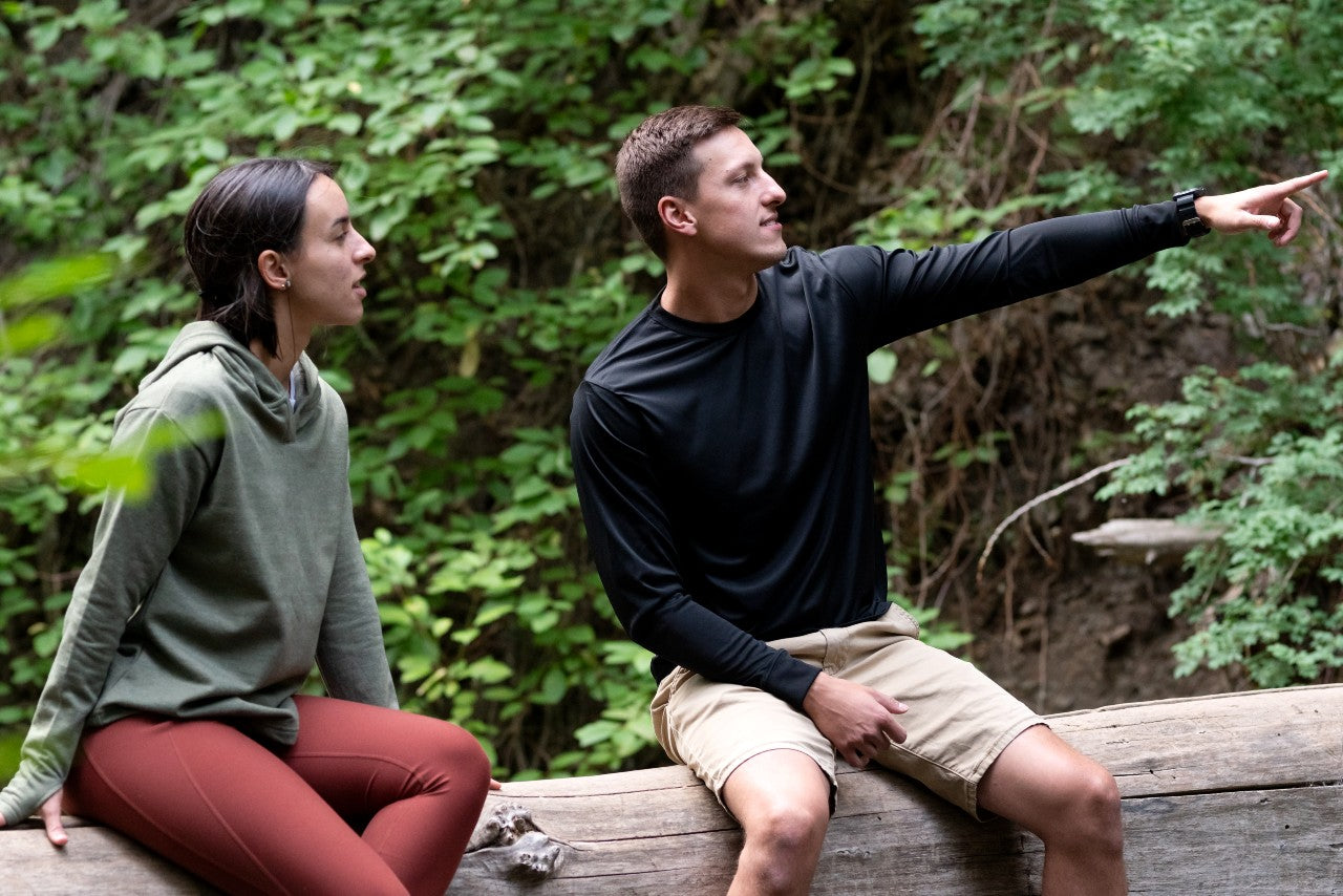 Man and Woman Hiking wearing GOEX Apparel
