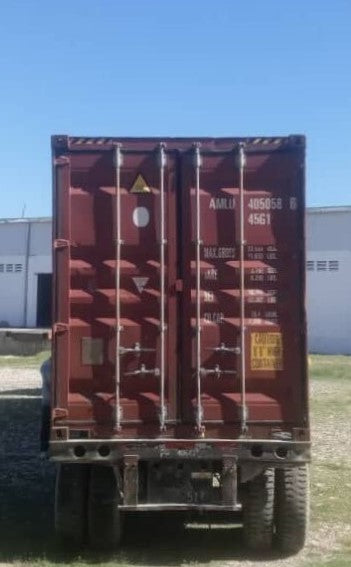 Stuck in port since August, a container of fabric arrives at LIFE Haiti, ready to be sewn