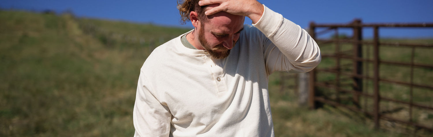 Male Model wearing GOEX Unisex and Men's Eco Cotton Henley at ranch