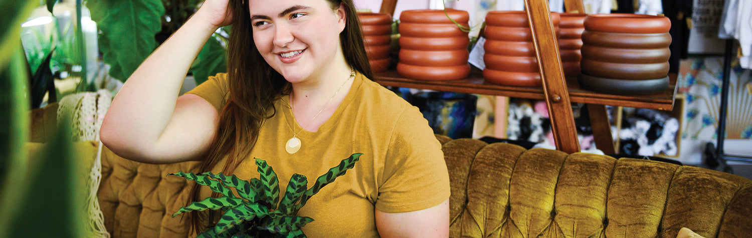 Female Model wearing GOEX Ladies Eco Triblend Tee in Mustard