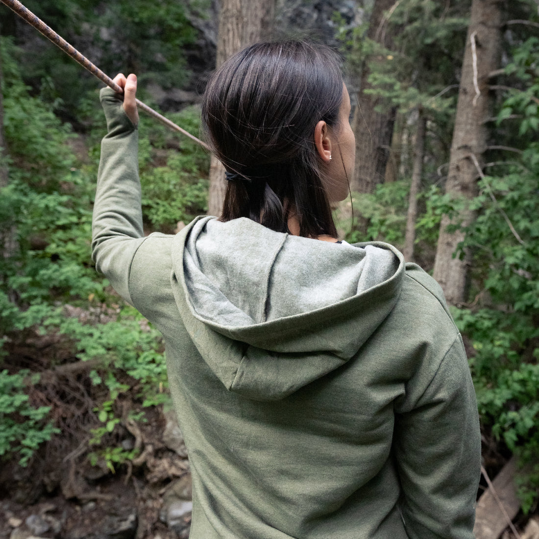 Female Model wearing GOEX Ladies Fleece Hoodie in Olive