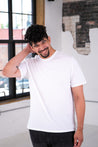 Male Model wearing GOEX Unisex and Men's Cotton Tee in White