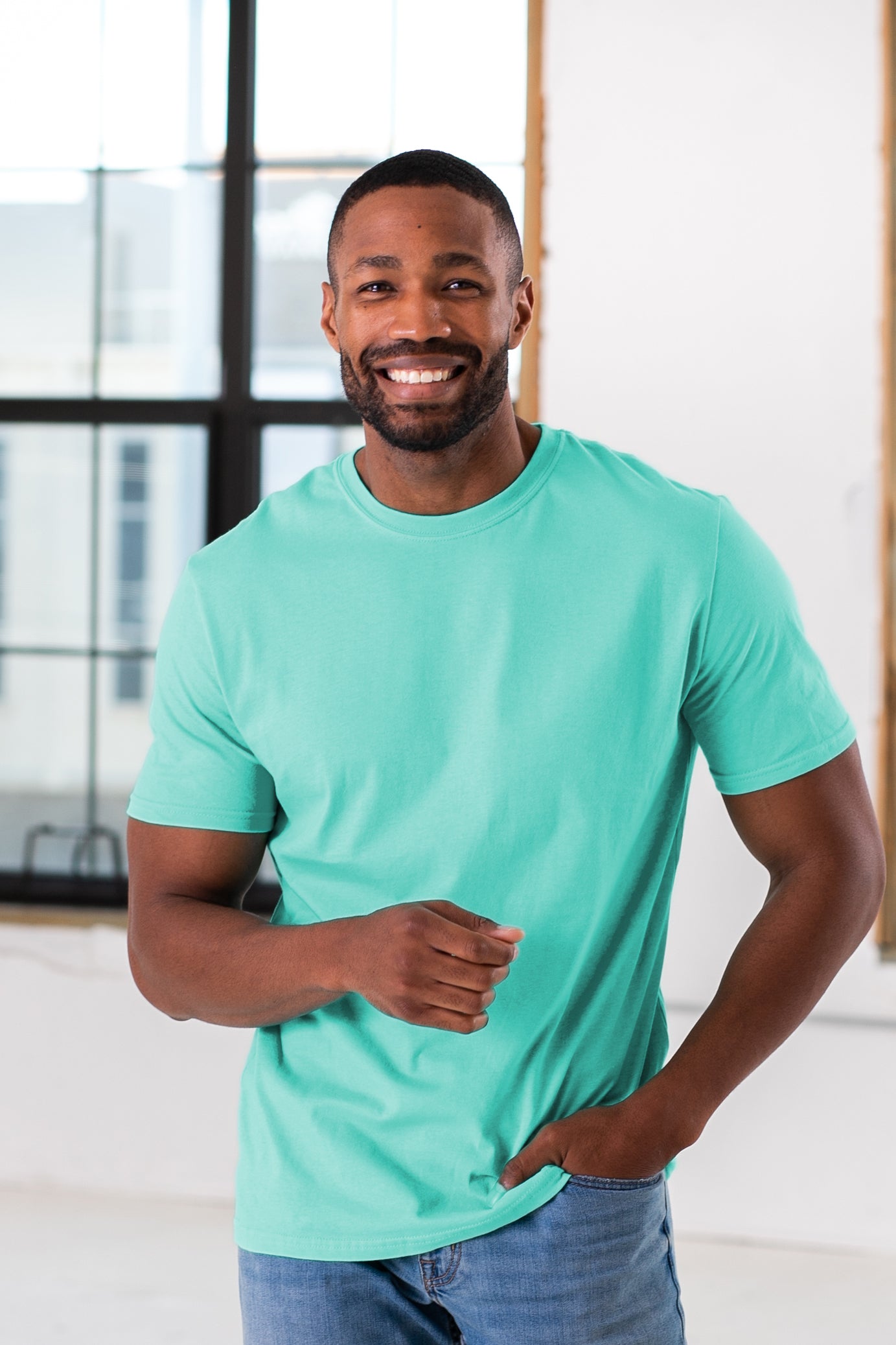 Male Model wearing GOEX Unisex and Men's Cotton Tee in Mint