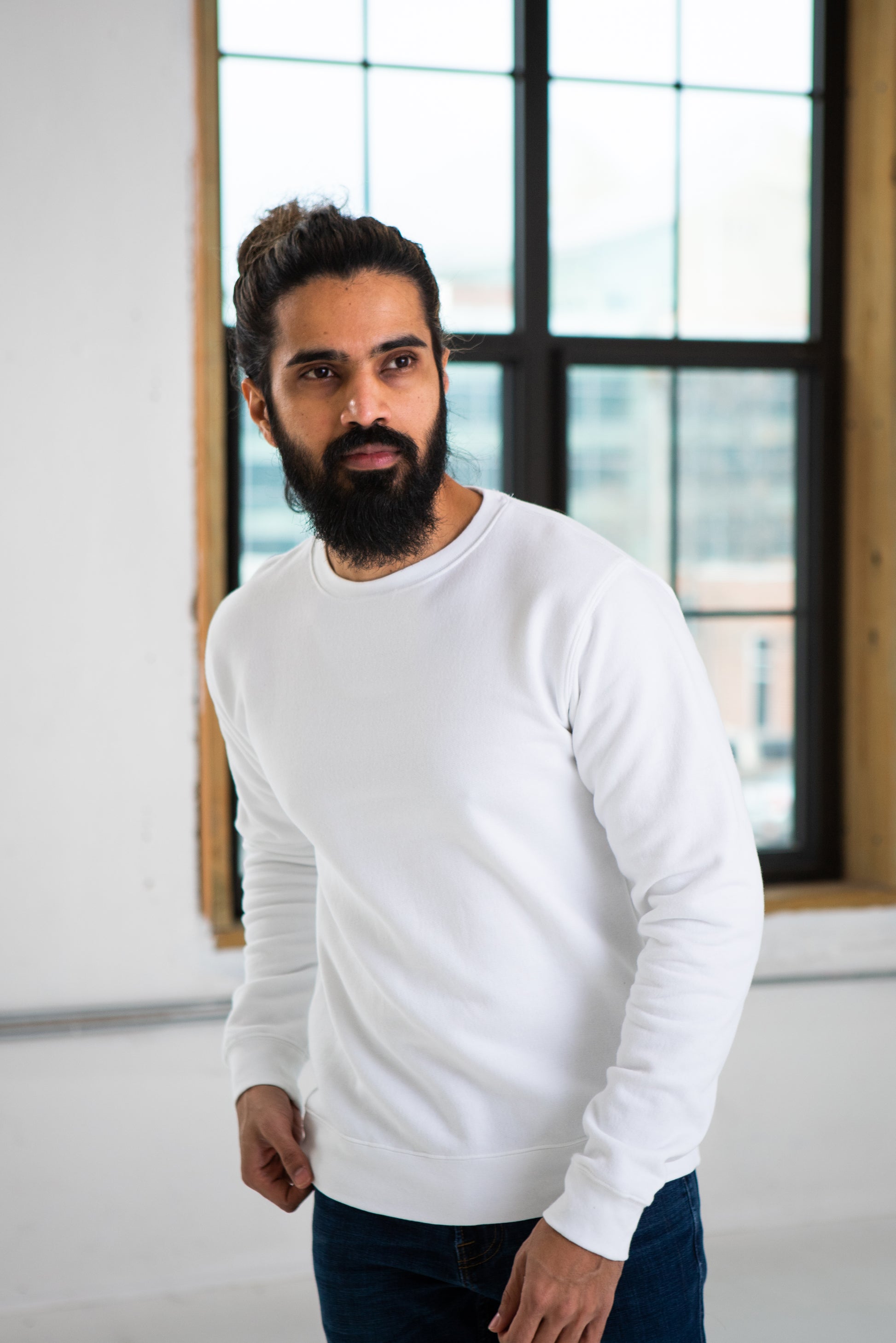 Male Model wearing GOEX Unisex and Men's Fleece Crew in White