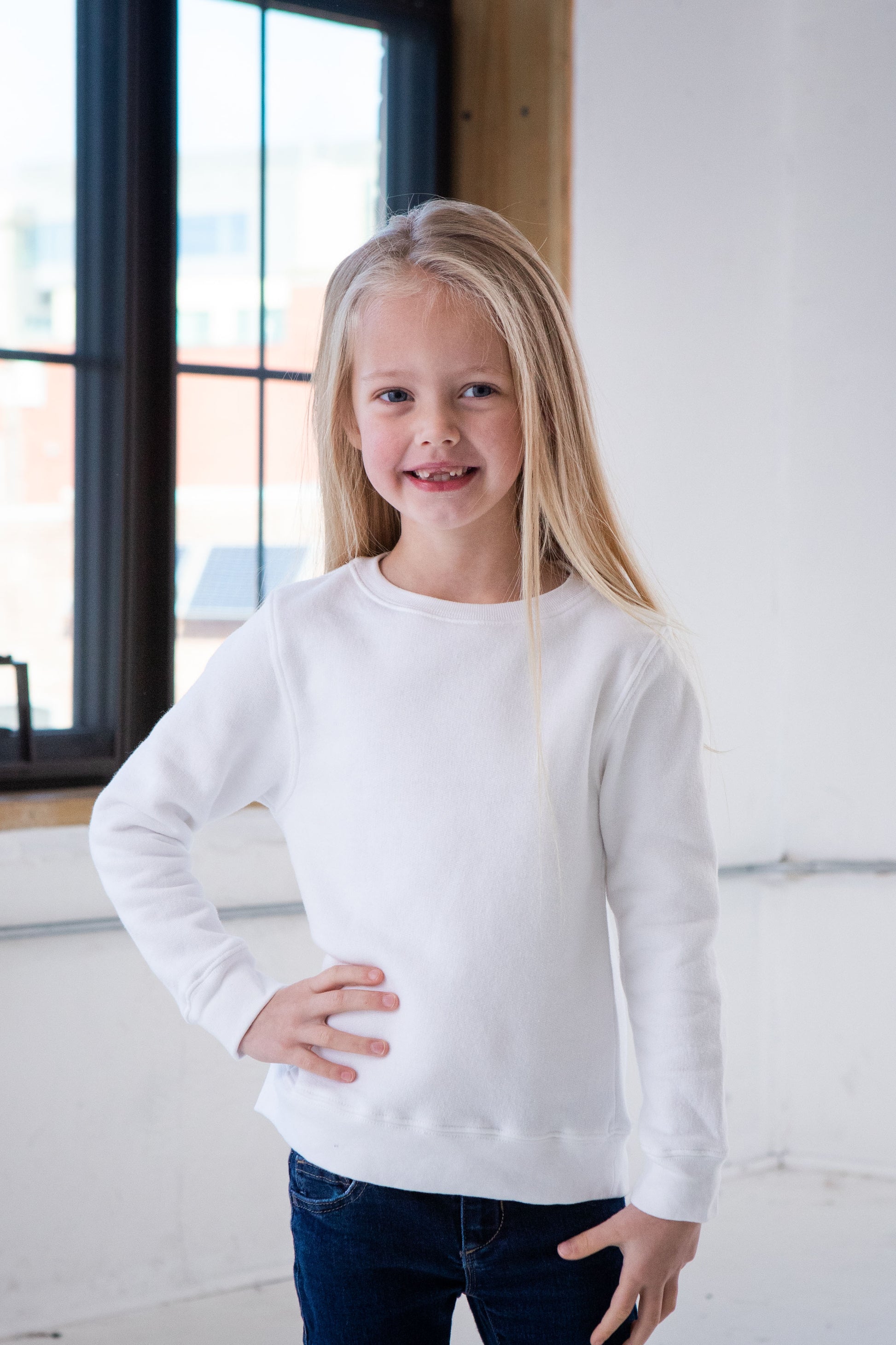 Girl Model wearing GOEX Youth Fleece Crew in White