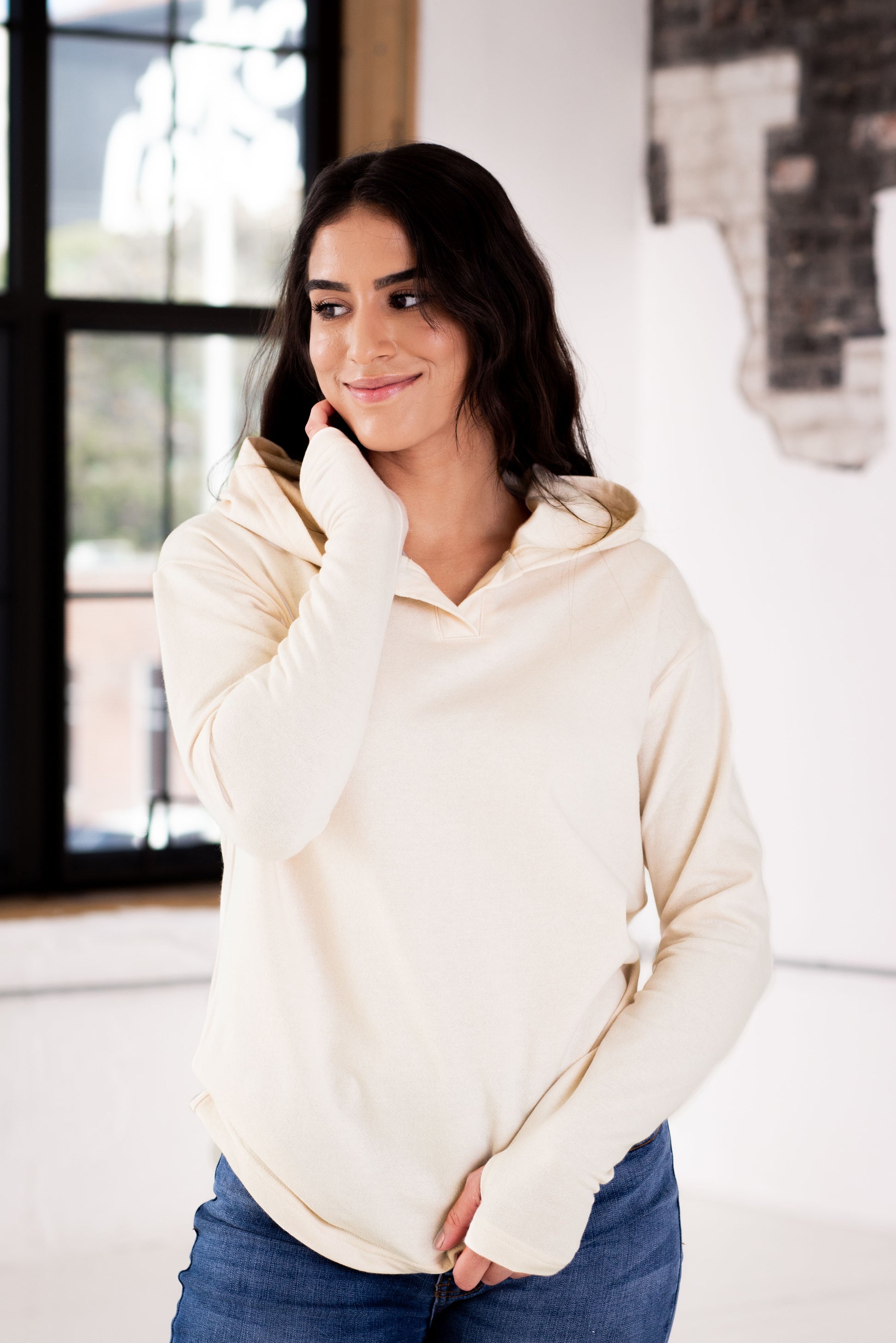 Female Model wearing GOEX Ladies Fleece Hoodie in Ivory