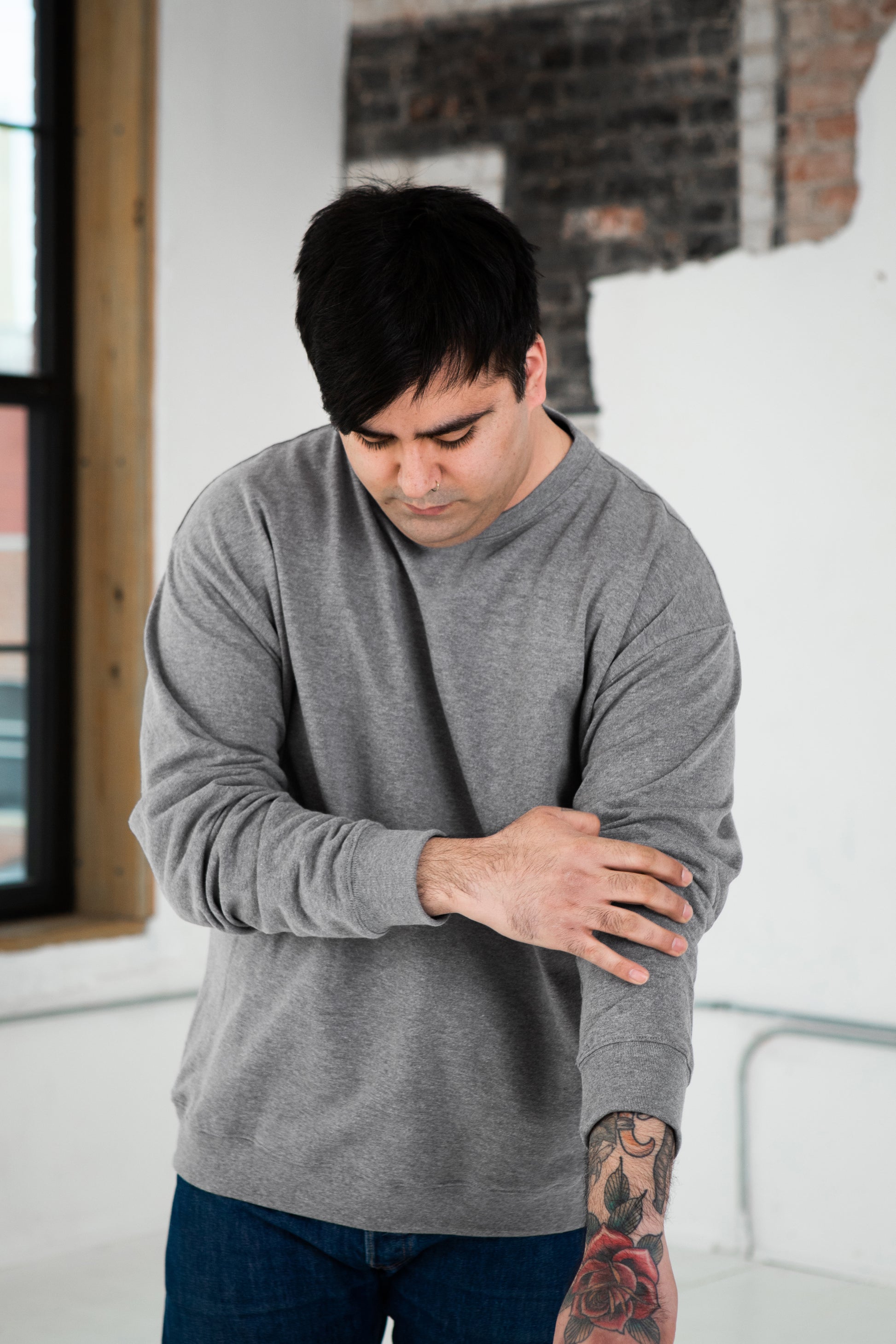 Male Model wearing GOEX Unisex and Men's Fleece Crew in Heather Grey