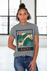 Female Model wearing GOEX Unisex and Men's Haiti Eco Triblend Graphic Tee in Heather Grey