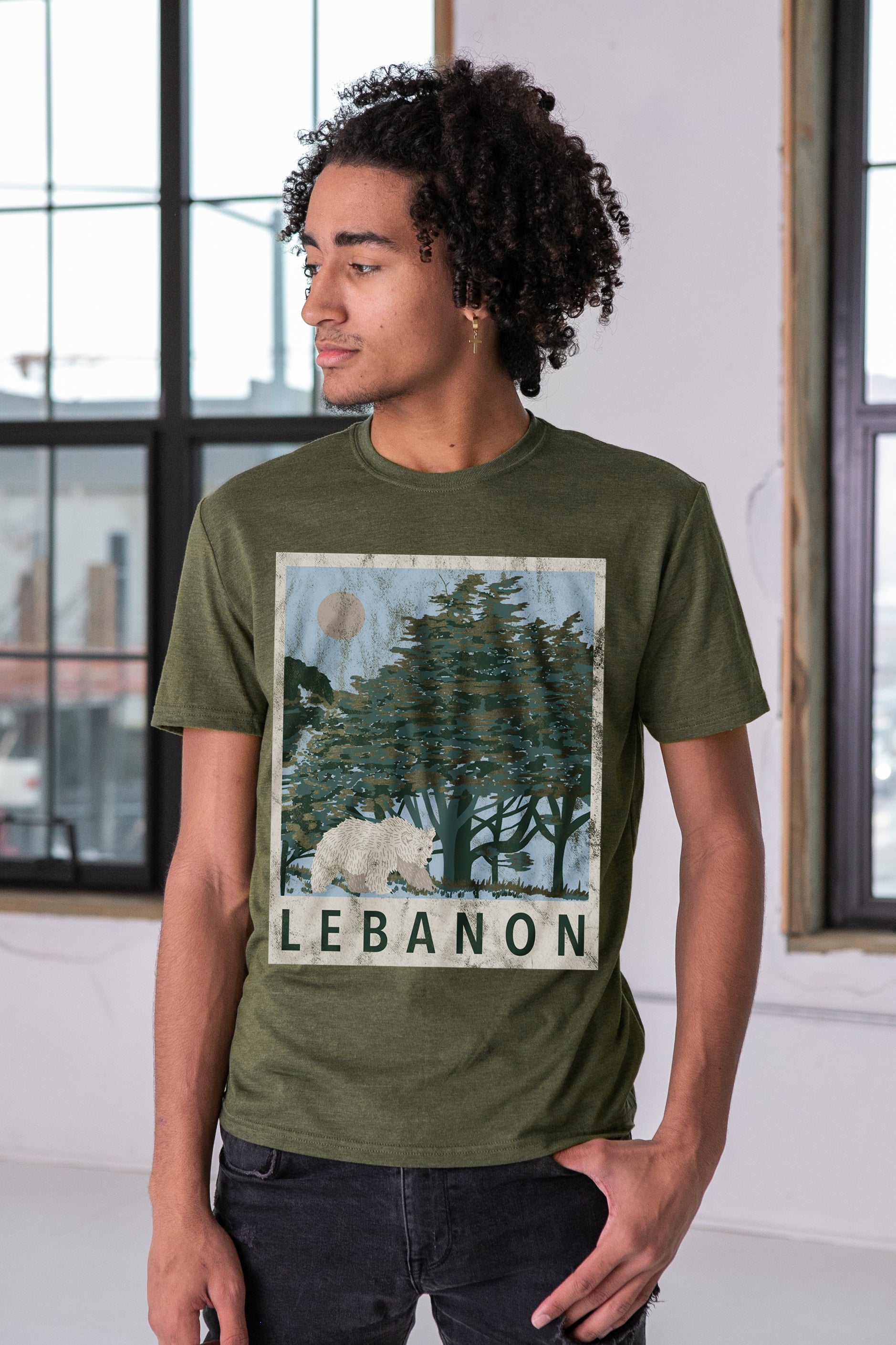 Male Model wearing GOEX Unisex and Men's Lebanon Eco Triblend Graphic Tee in Olive