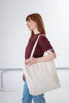 Female Model Carrying GOEX Cotton Canvas Tote in Natural