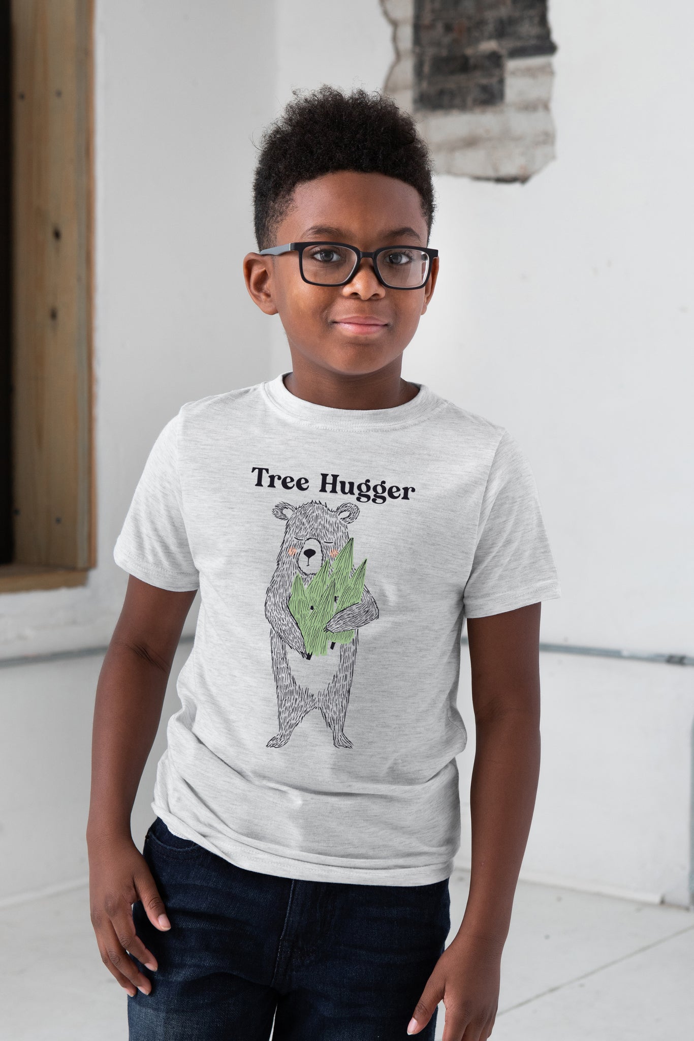 Boy Model wearing GOEX Youth Tree Hugger Eco Triblend Graphic Tee in Vintage White
