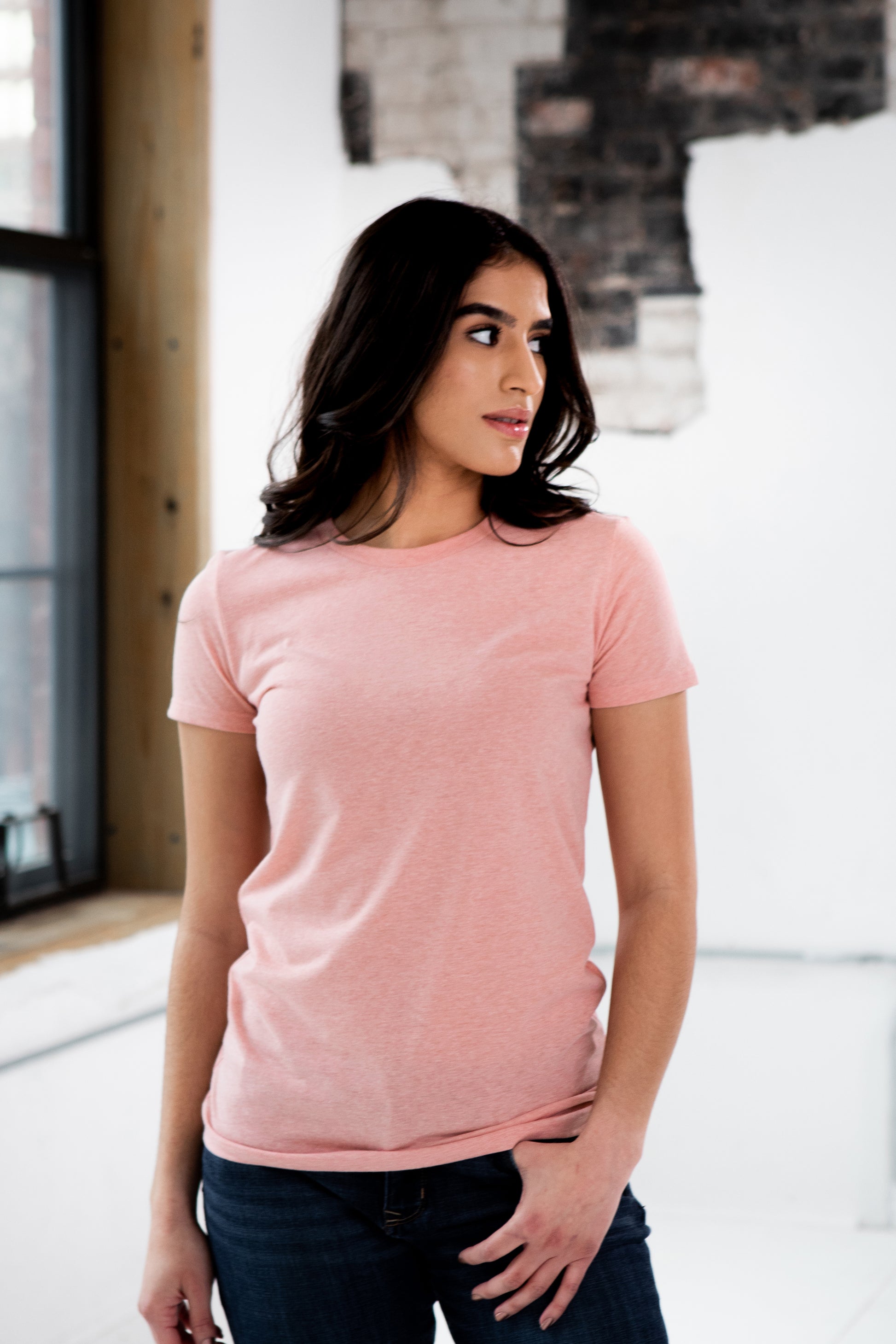 Female Model wearing GOEX Ladies Eco Triblend Tee in Rose