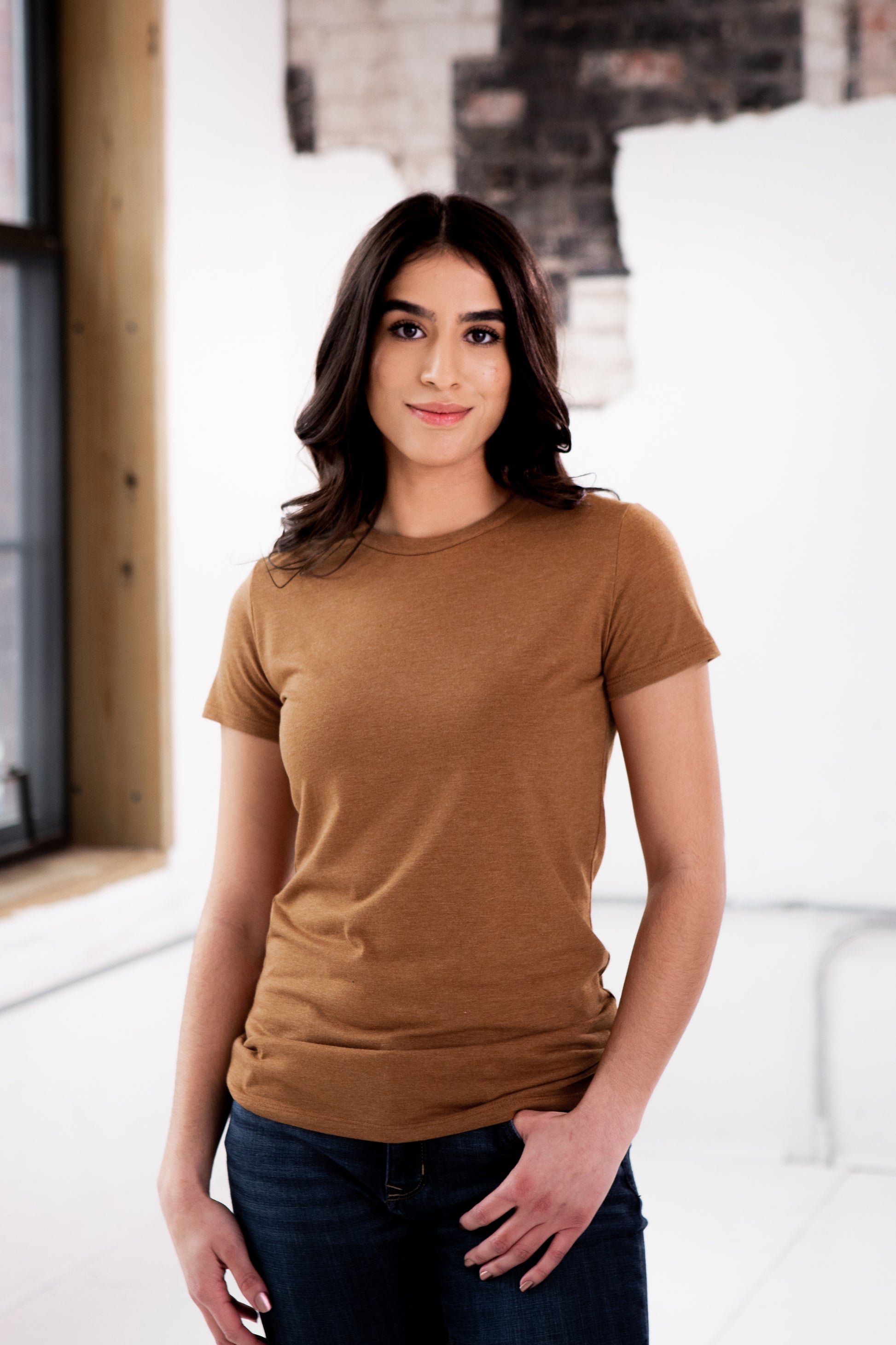 Female Model wearing GOEX Ladies Eco Triblend Tee in Amber