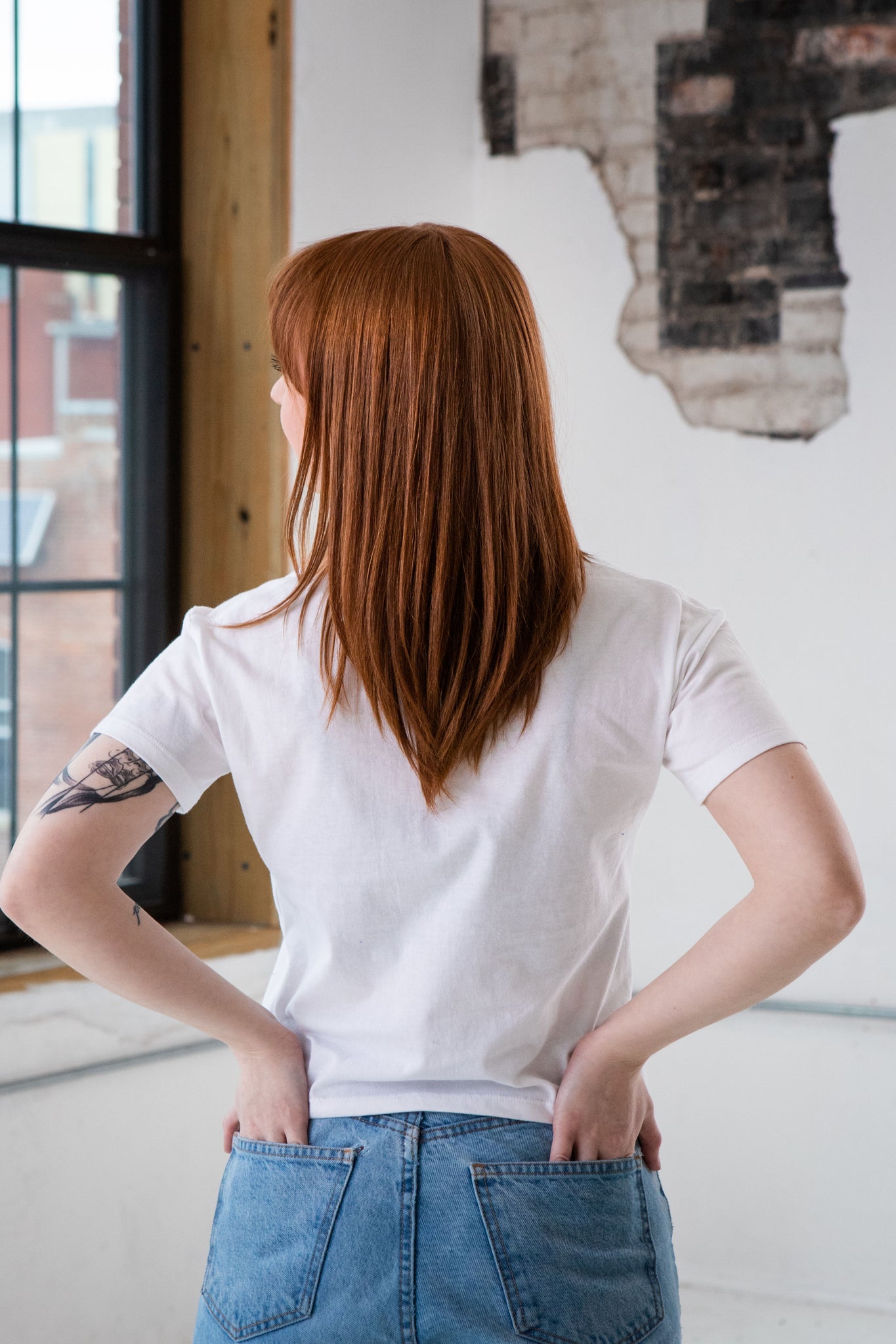 Back View of Female Model wearing GOEX Ladies Cotton Crop Tee in White