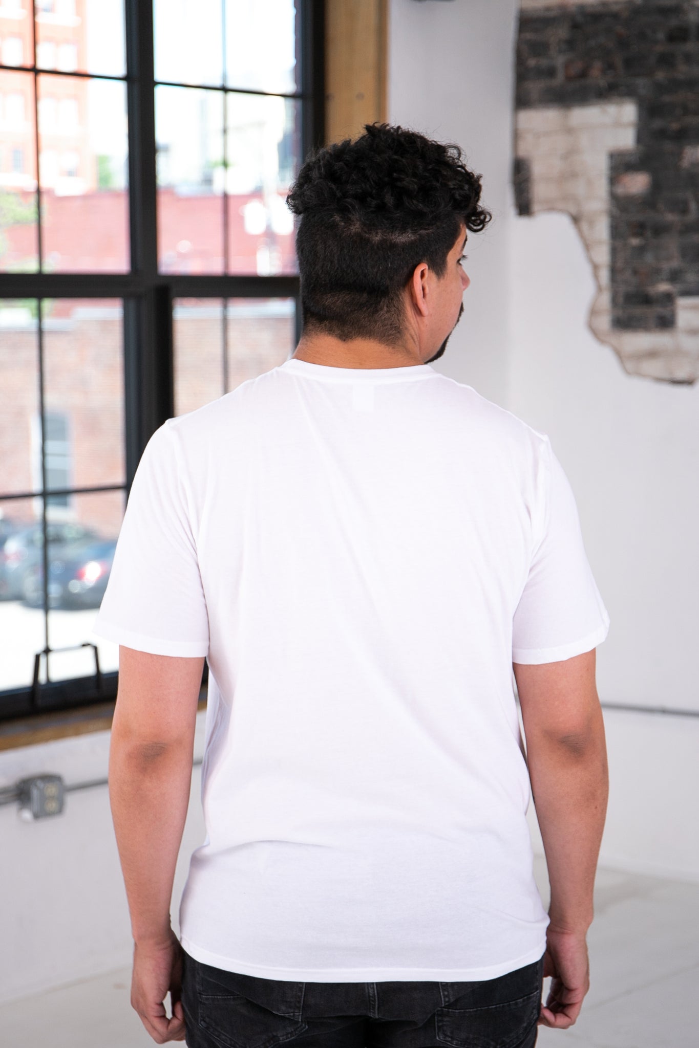 Back View of Male Model wearing GOEX Unisex and Men's Cotton Tee in White