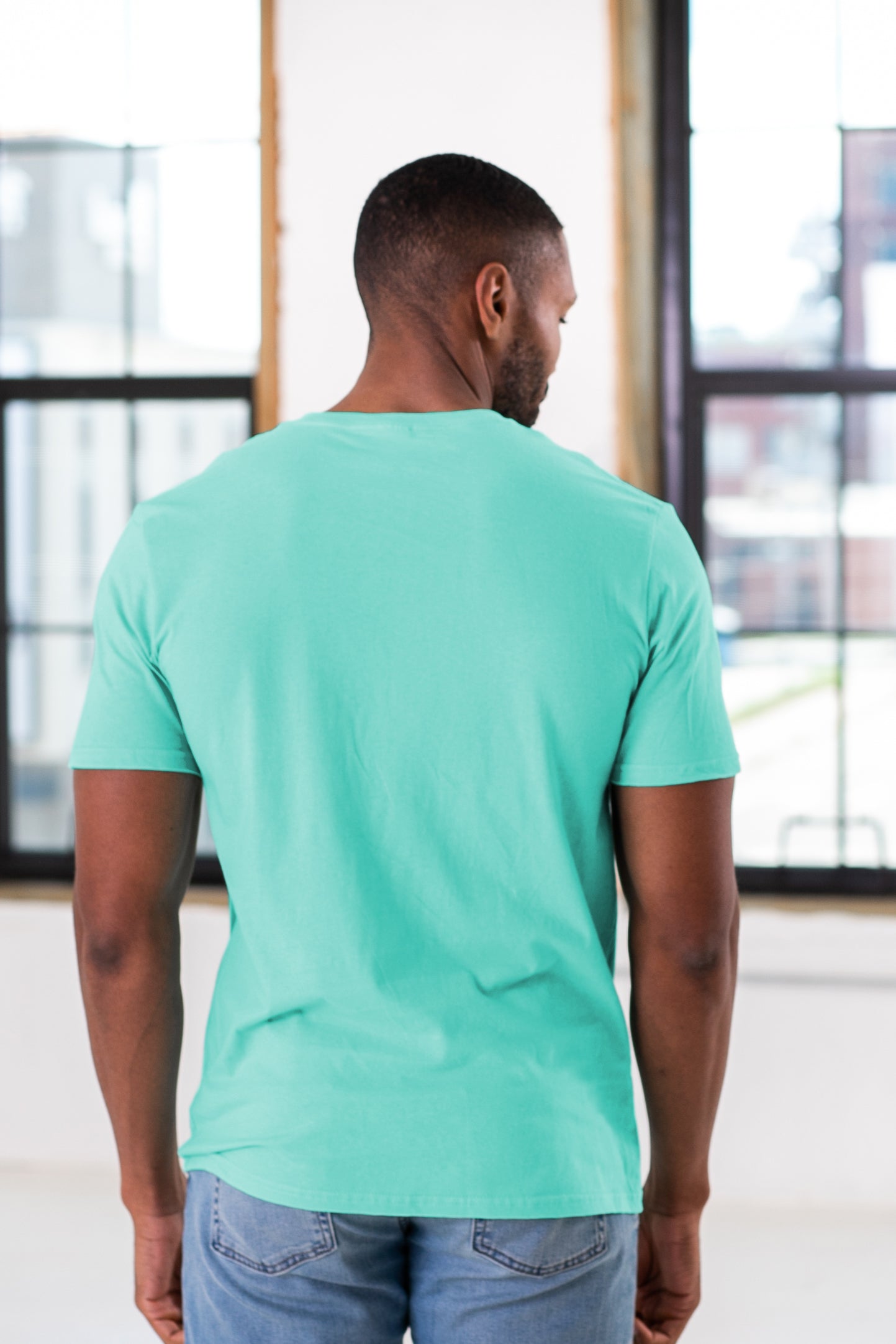 Male Model wearing GOEX Unisex and Men's Cotton Tee in Mint