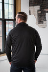 Back View of Male Model wearing GOEX Unisex and Men's Eco Poly 1/4 Zip in Black