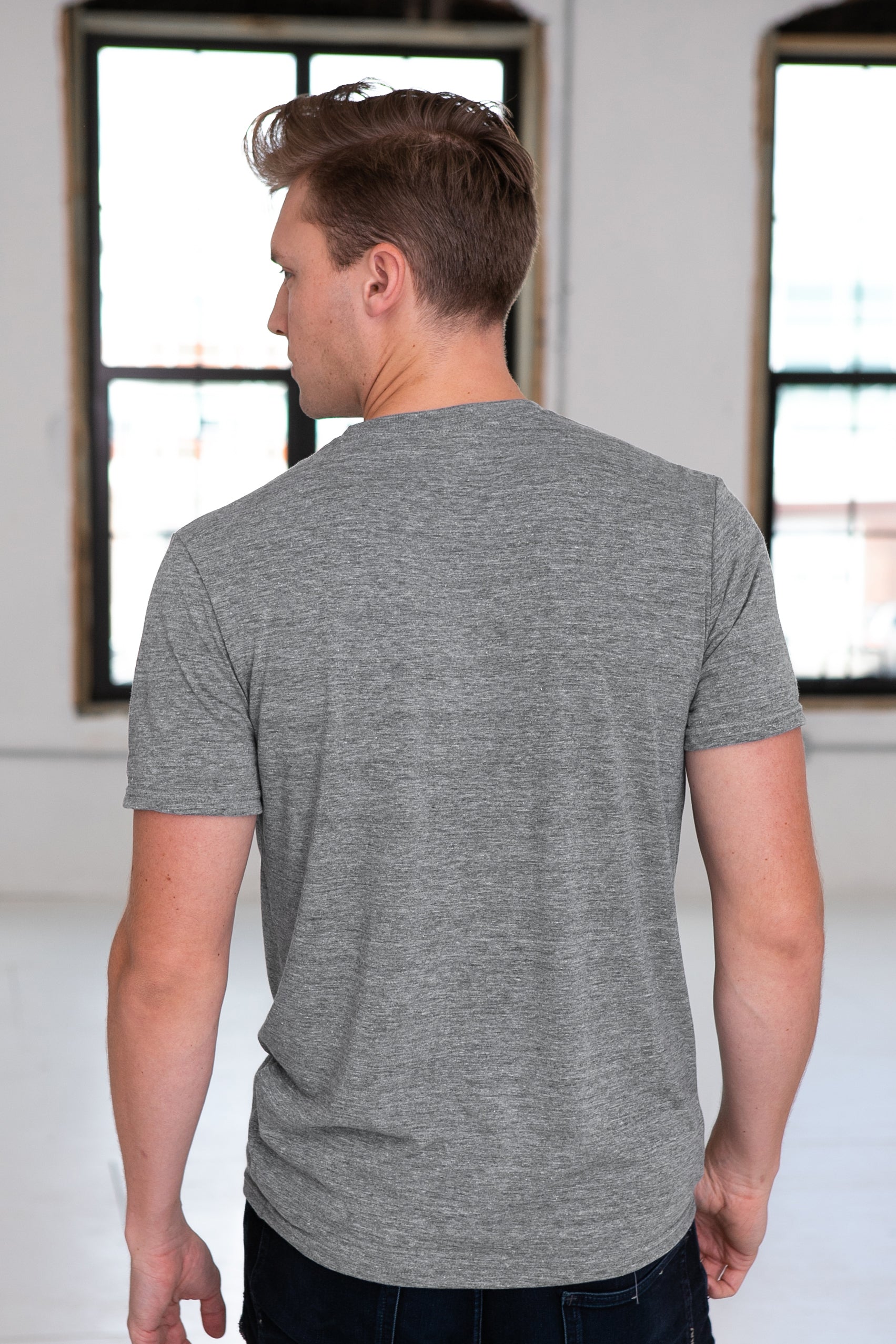 Male Model wearing GOEX Unisex and Men's Eco Triblend V Neck Tee in Heather Grey