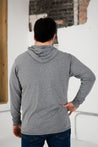 Male Model wearing GOEX Unisex and Men's Eco Triblend Hooded Tee in Heather Grey