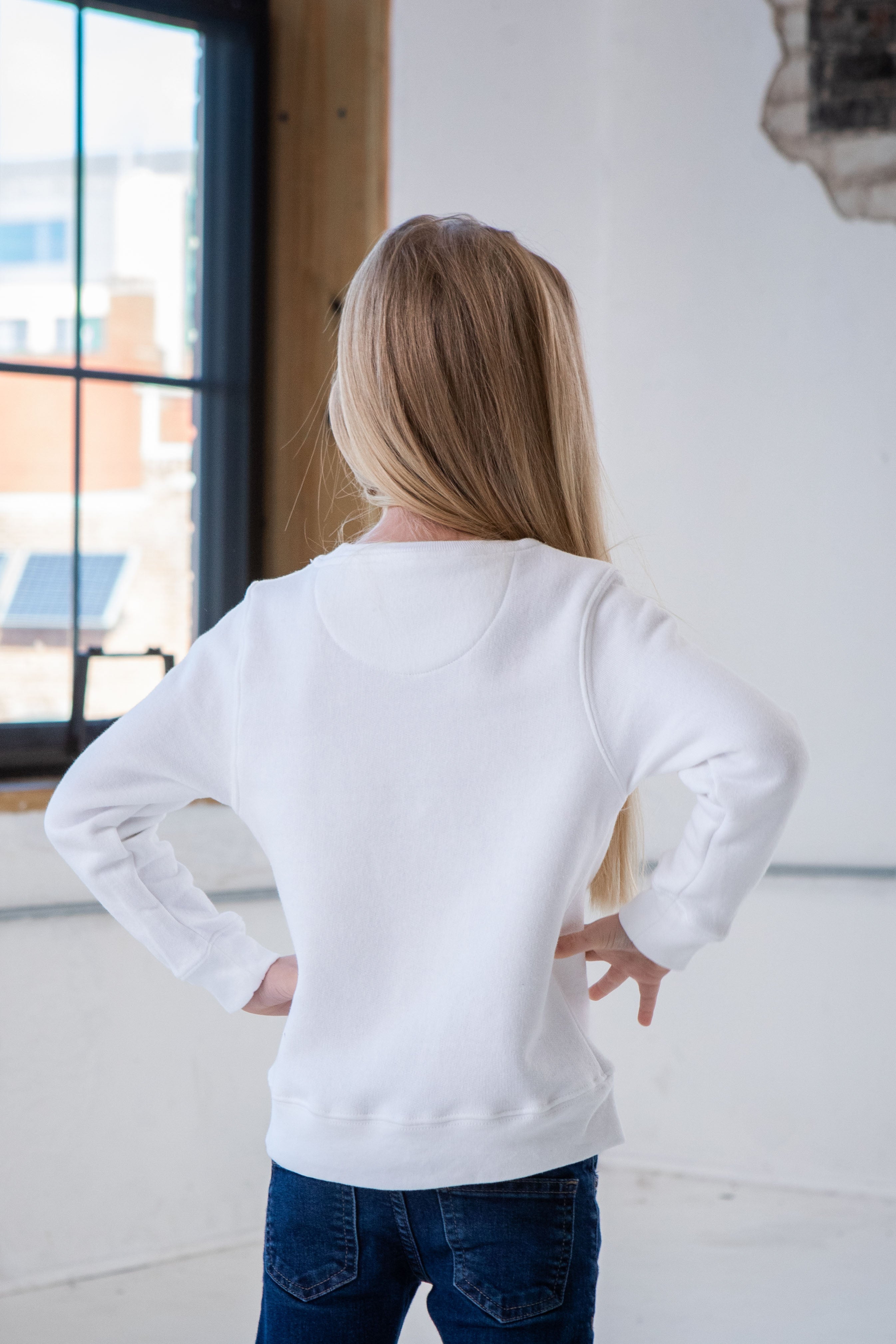 Back View of Girl Model wearing GOEX Youth Fleece Crew in White