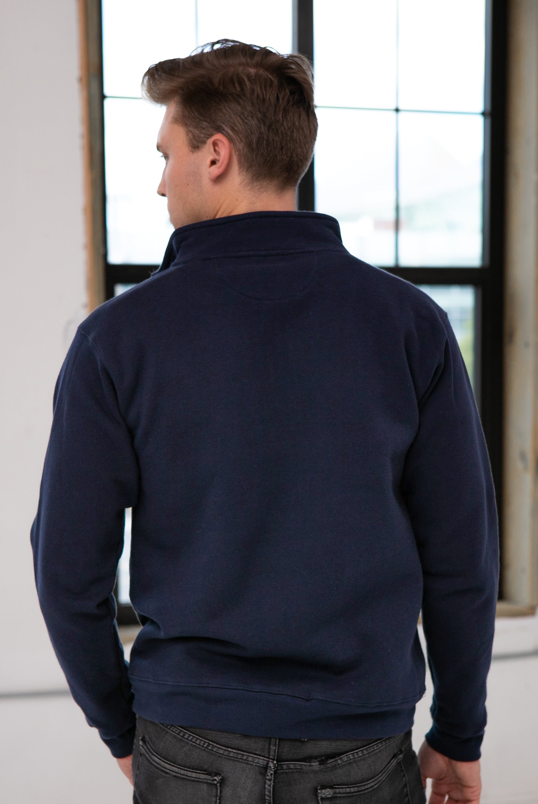 Back View of Male Model wearing GOEX Unisex and Men's Fleece 1/4 Zip in Navy