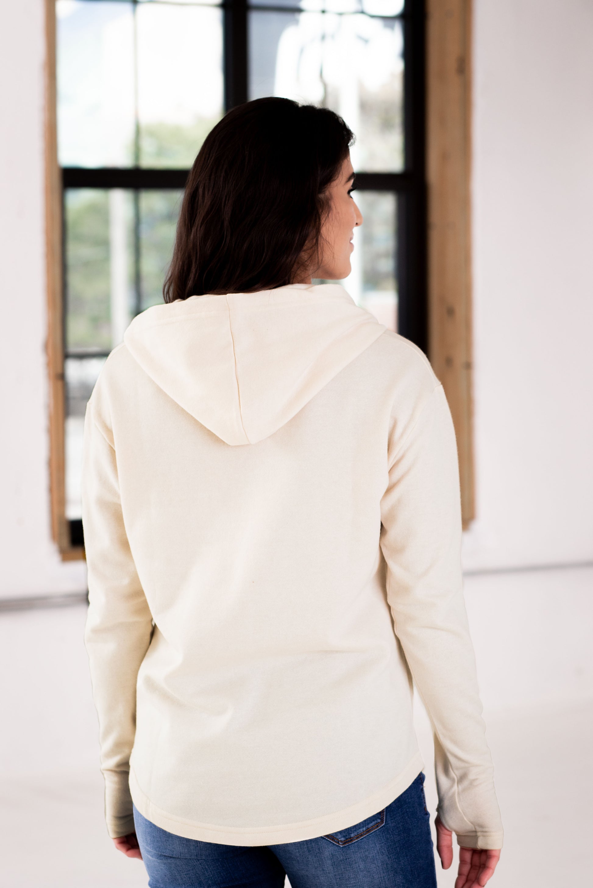 Back View of Female Model wearing GOEX Ladies Fleece Hoodie in Ivory