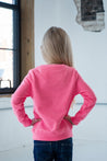 Back View of Girl Model wearing GOEX Youth Fleece Crew in Neon Pink