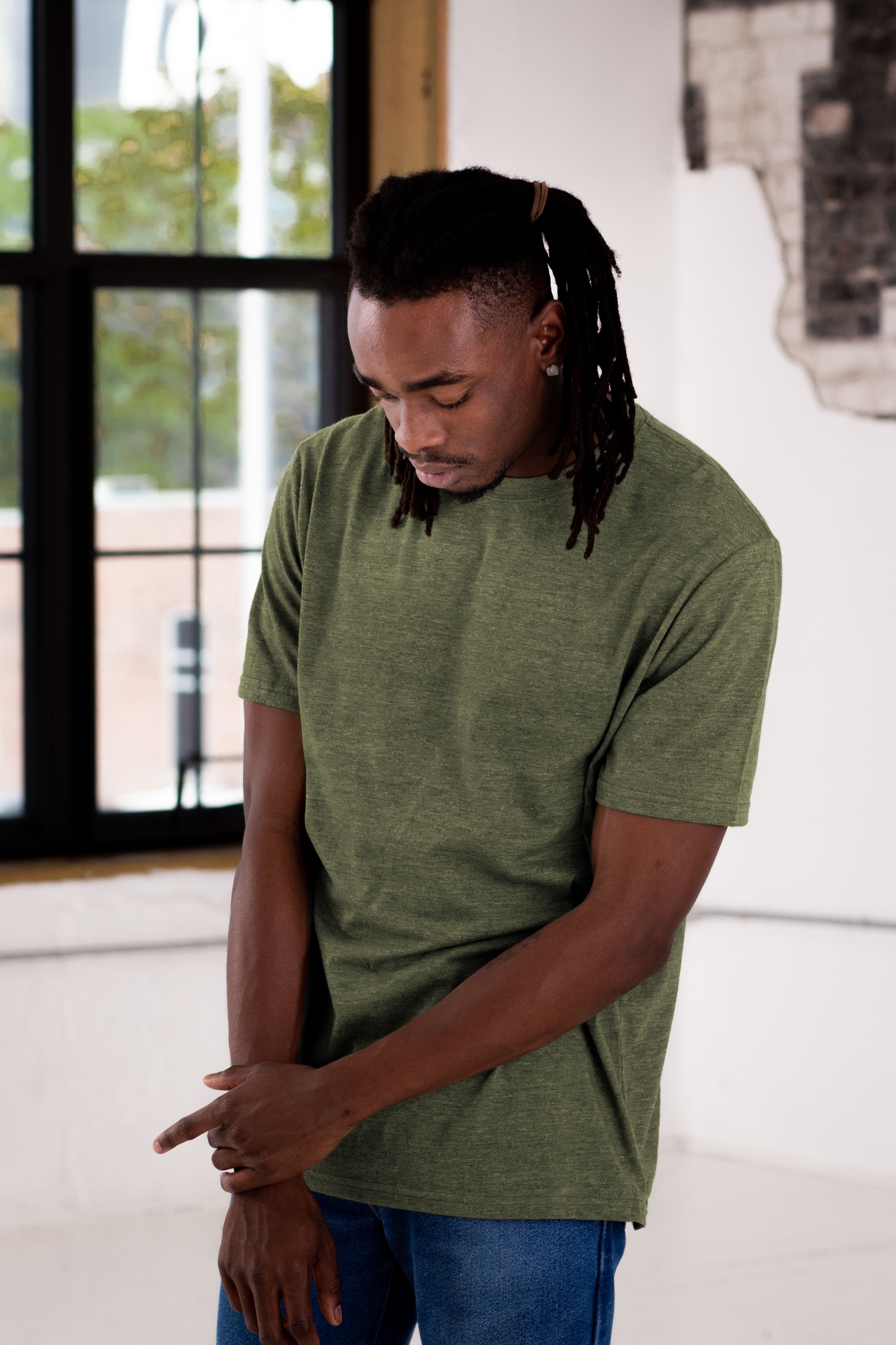 Male Model wearing GOEX Eco Triblend Unisex and Men's Tee in Olive