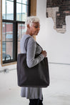 Female Model Carrying GOEX Cotton Canvas Tote in Black