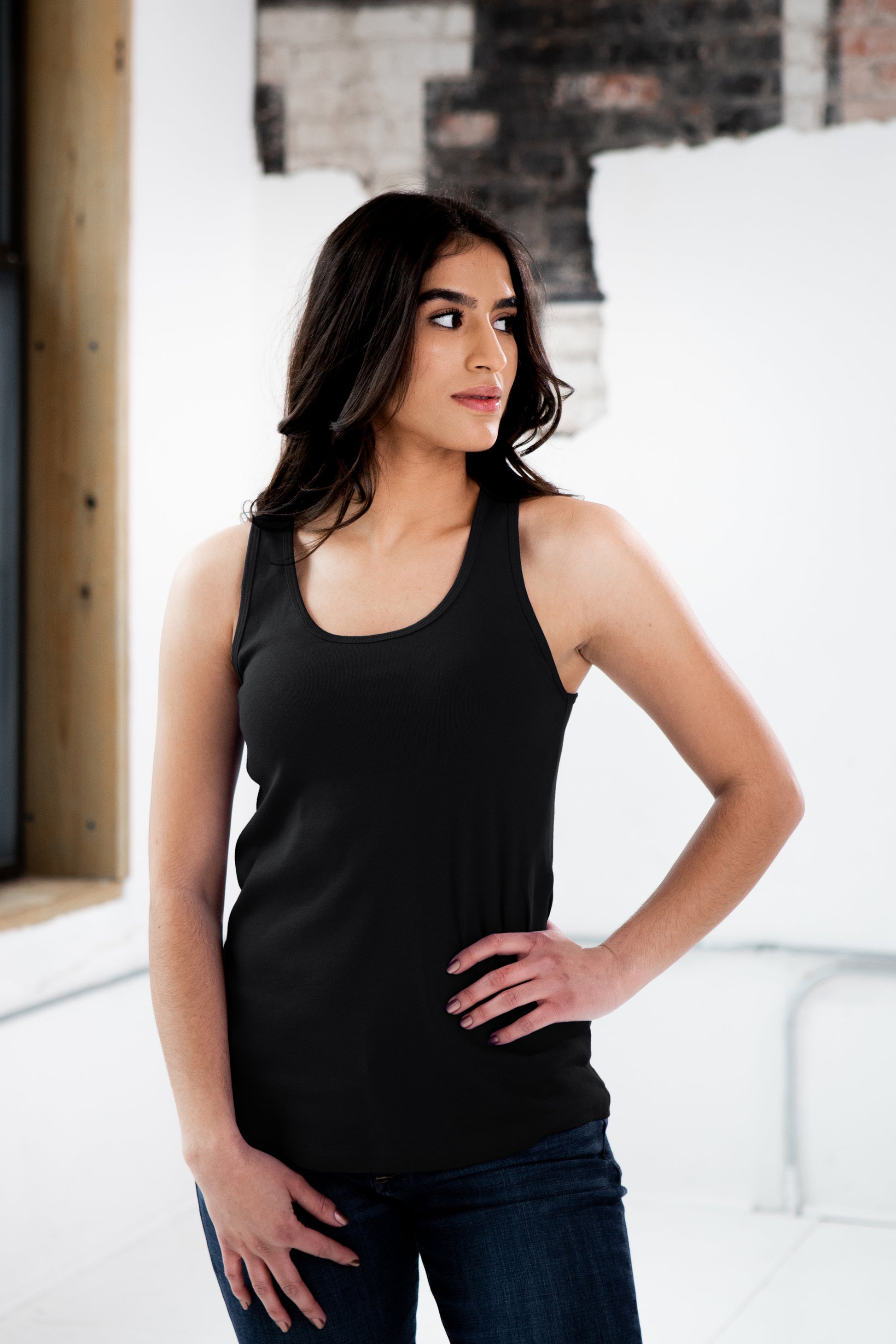 Female Model wearing GOEX Ladies Cotton Rib Tank in Black