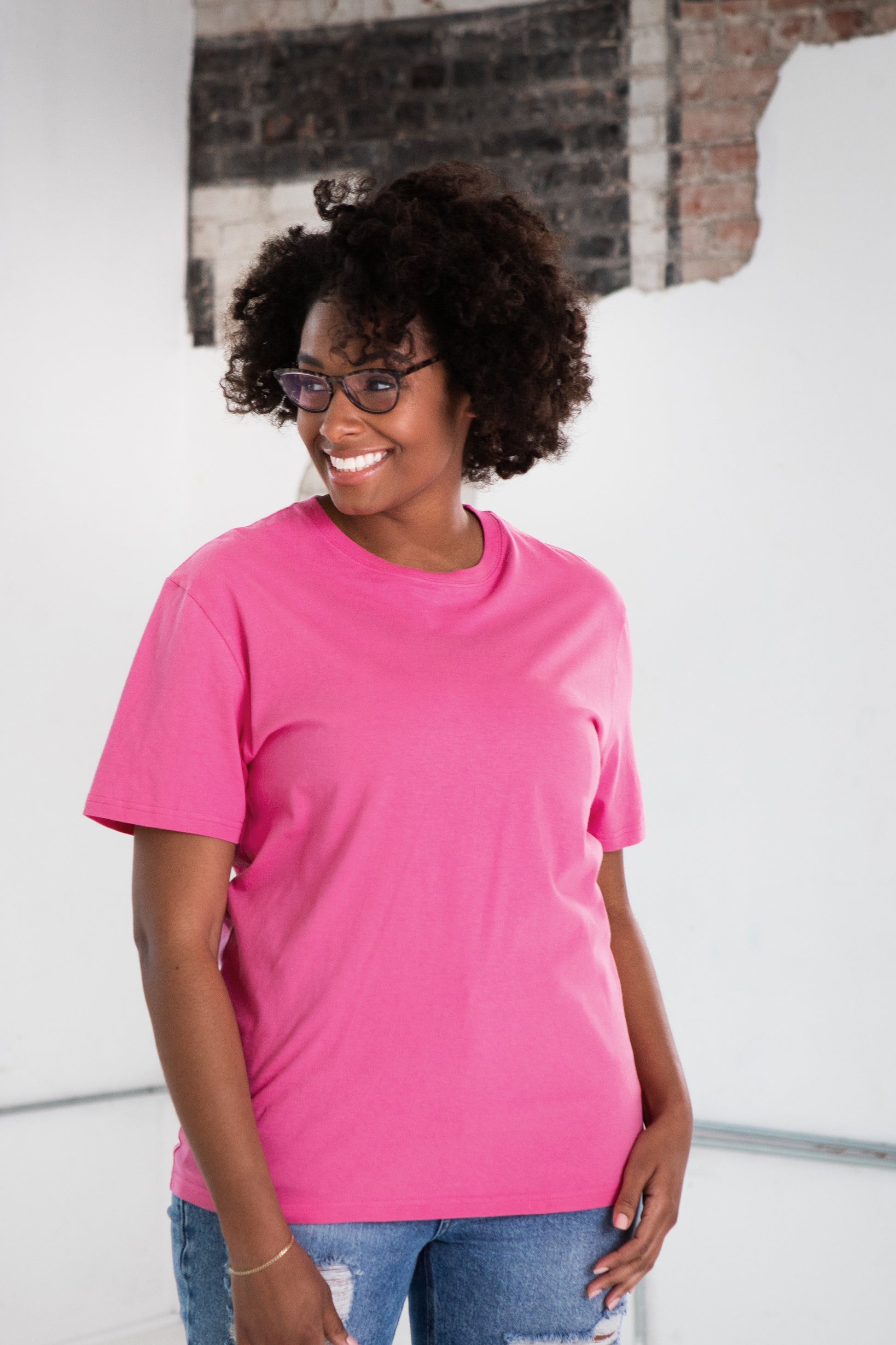 Female Model wearing GOEX Unisex and Men's Cotton Tee in Bubblegum