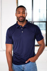 Male Model wearing GOEX Unisex and Men's Eco Poly Polo in Navy
