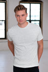 Male Model wearing GOEX Unisex and Men's Eco Triblend Tee in Vintage White