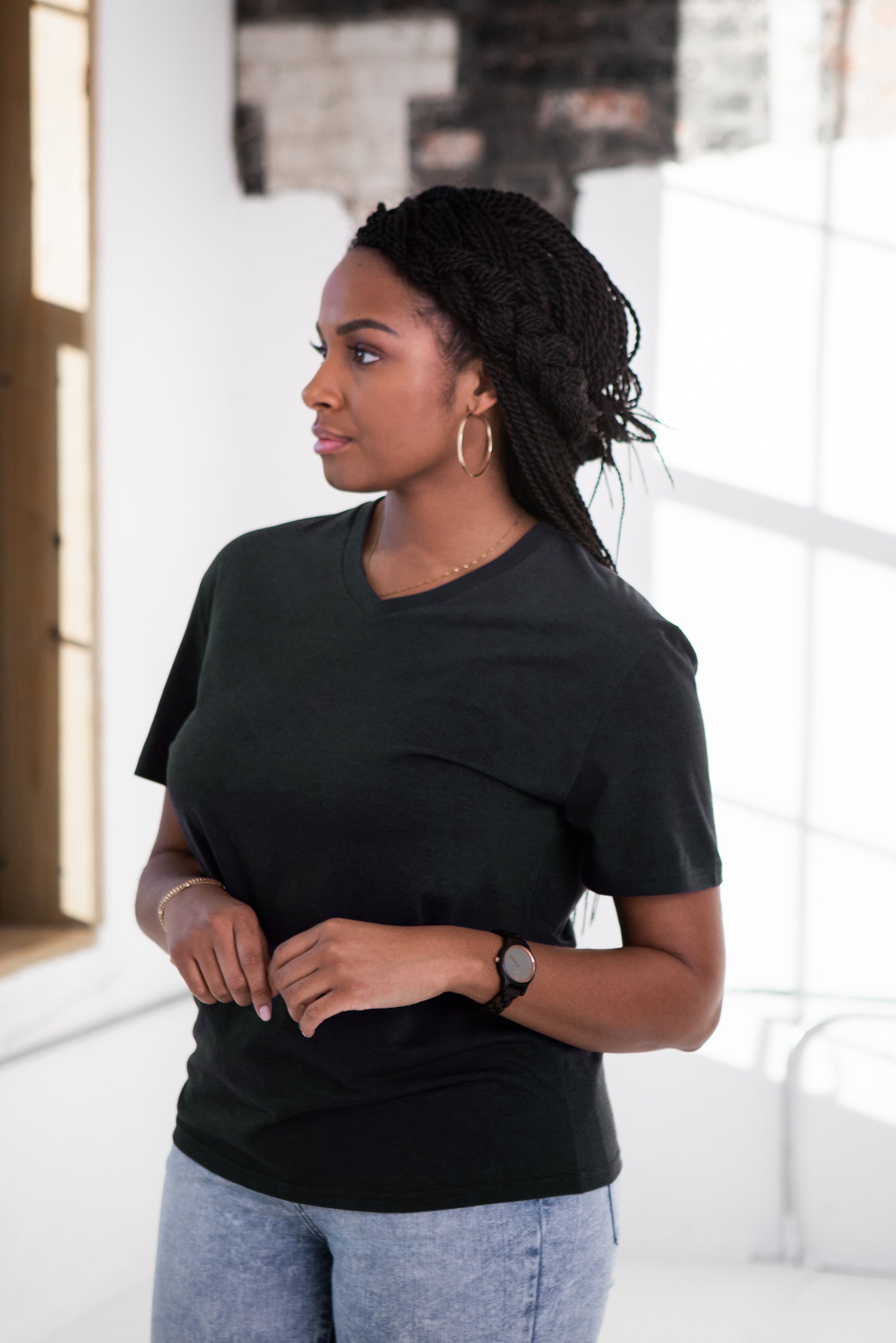 Female Model wearing GOEX Unisex and Men's Eco Triblend V Neck Tee in Charcoal