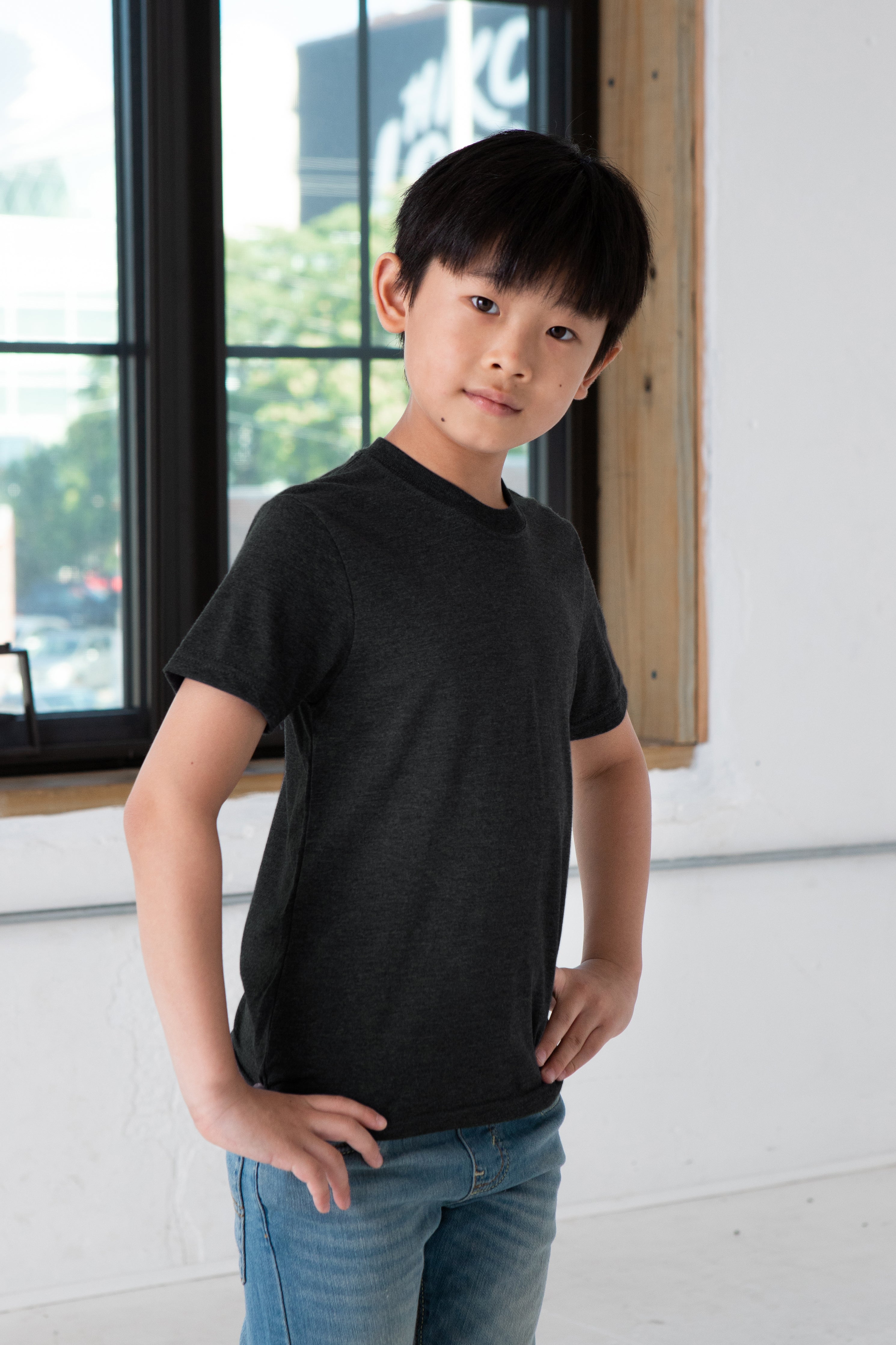 Boy Model wearing GOEX Youth Eco Triblend Tee in Charcoal