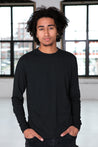 Male Model wearing GOEX Unisex and Men's Eco Triblend LS Tee in Charcoal