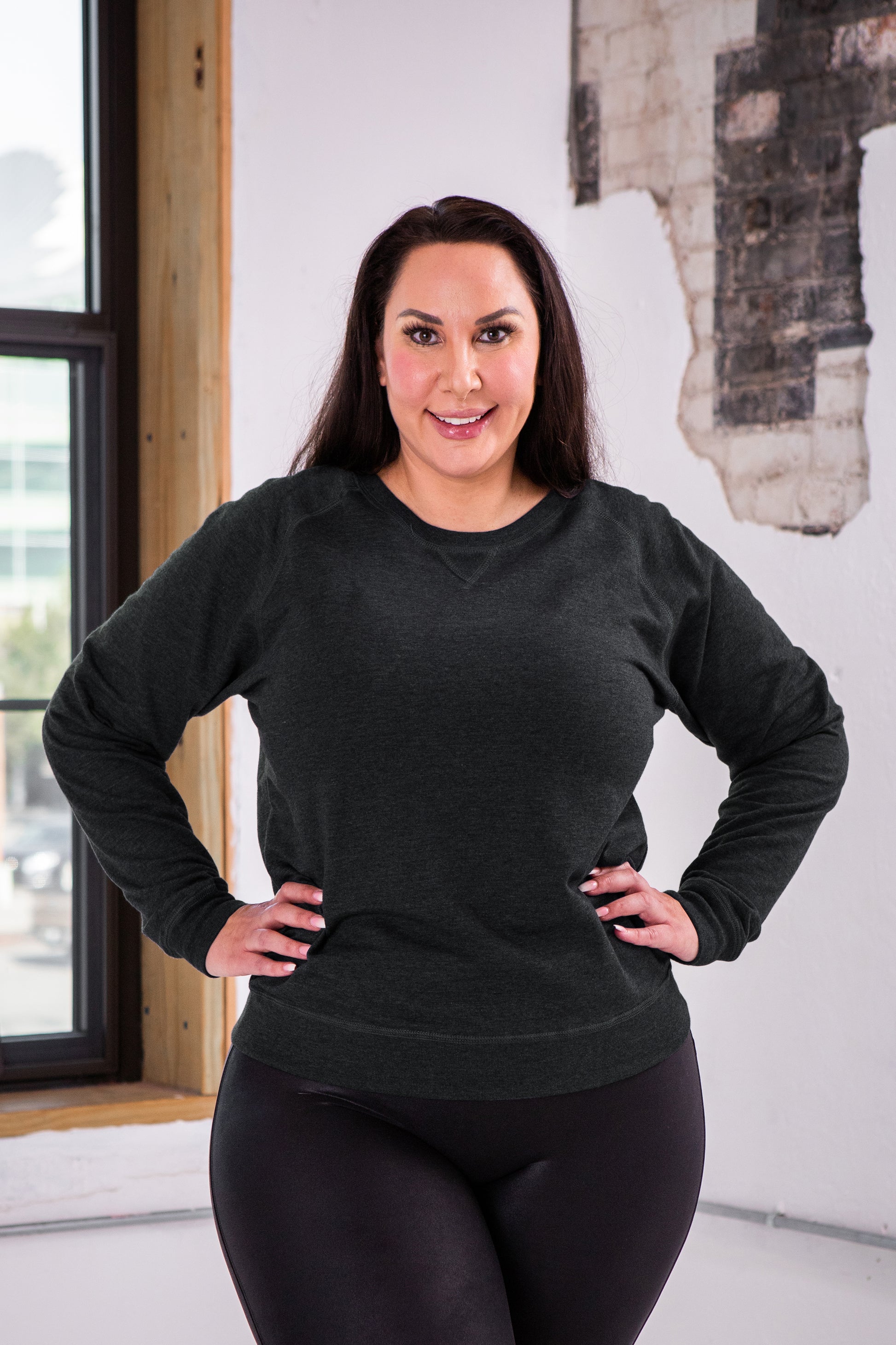 Female Model wearing GOEX Ladies Fleece Crew in Charcoal