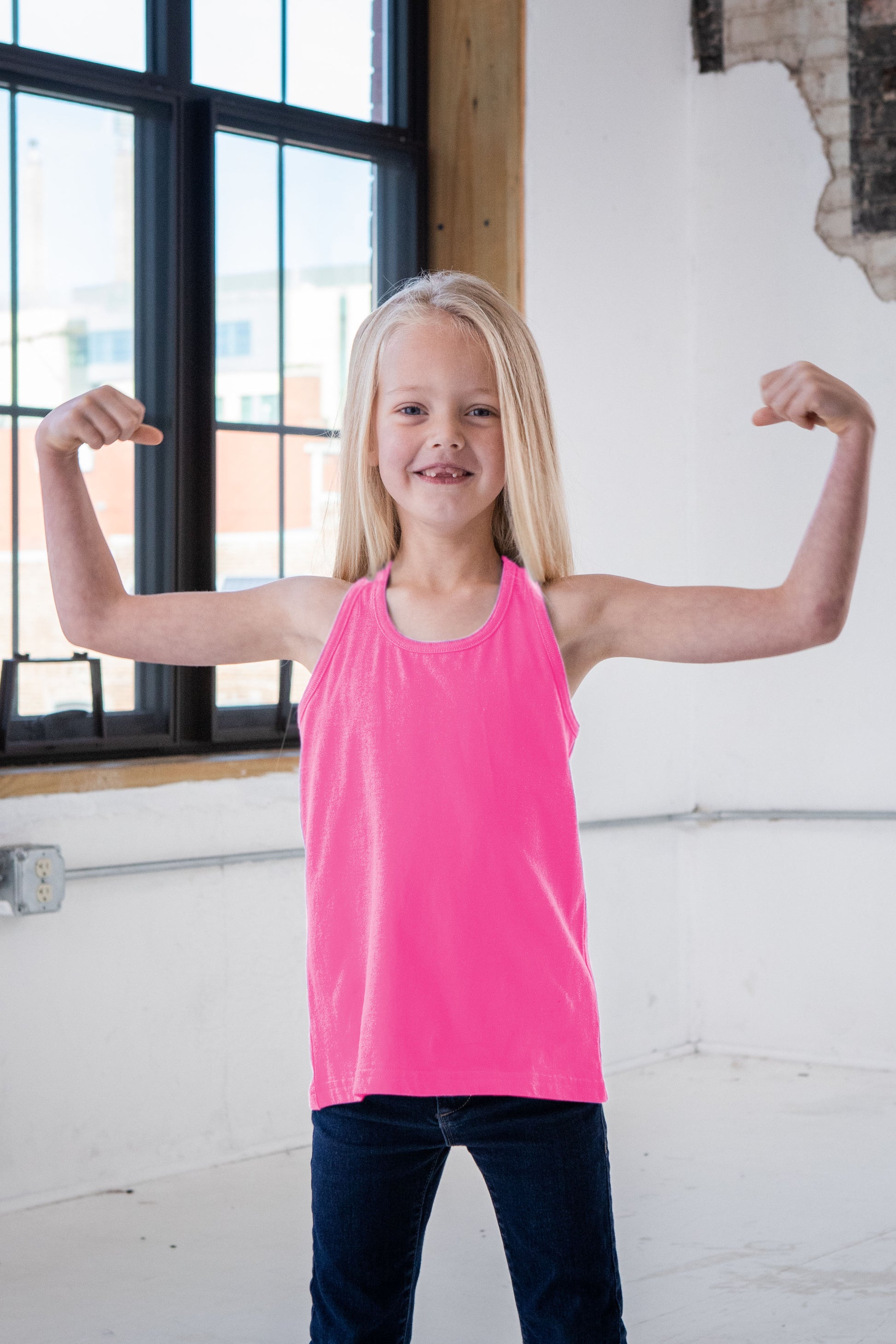 Girl Model wearing GOEX Youth Cotton Tank in Bubblegum
