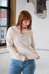 Female Model wearing GOEX Unisex and Men's Eco Cotton Henley in Ivory