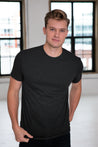 Male Model wearing GOEX Unisex and Men's Eco Triblend Tee in Charcoal