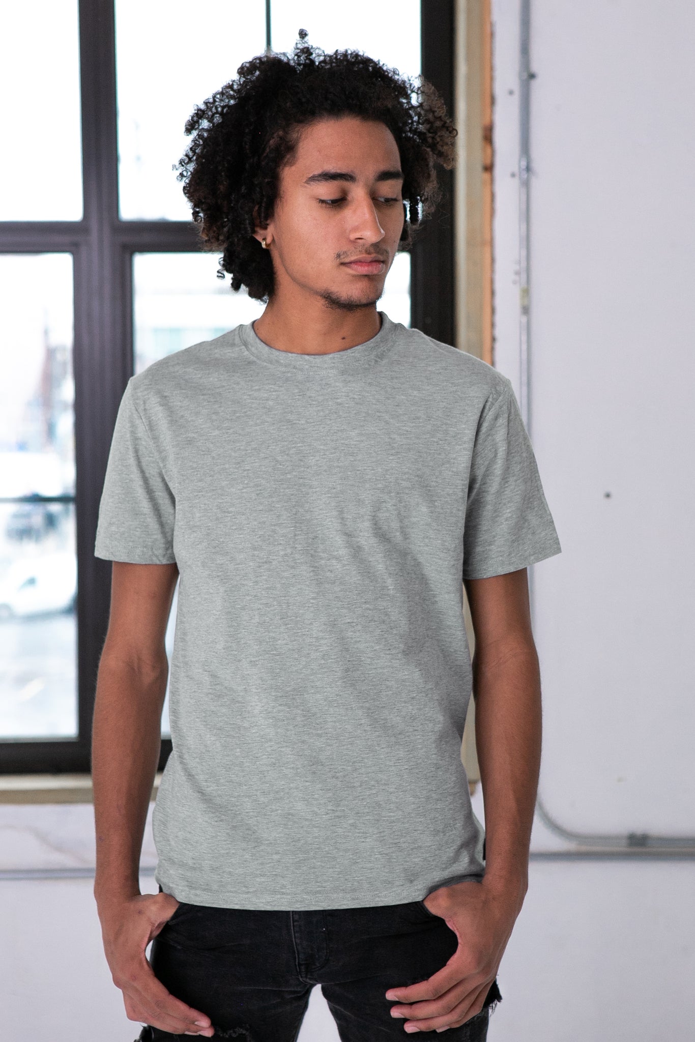 Male Model wearing GOEX Unisex and Men's Standard Cotton Tee in Oxford