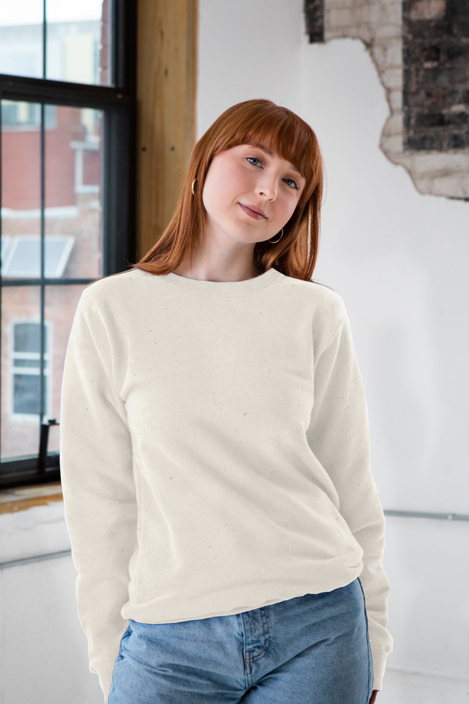 Female Model wearing GOEX Unisex and Men's Fleece Crew in Ivory
