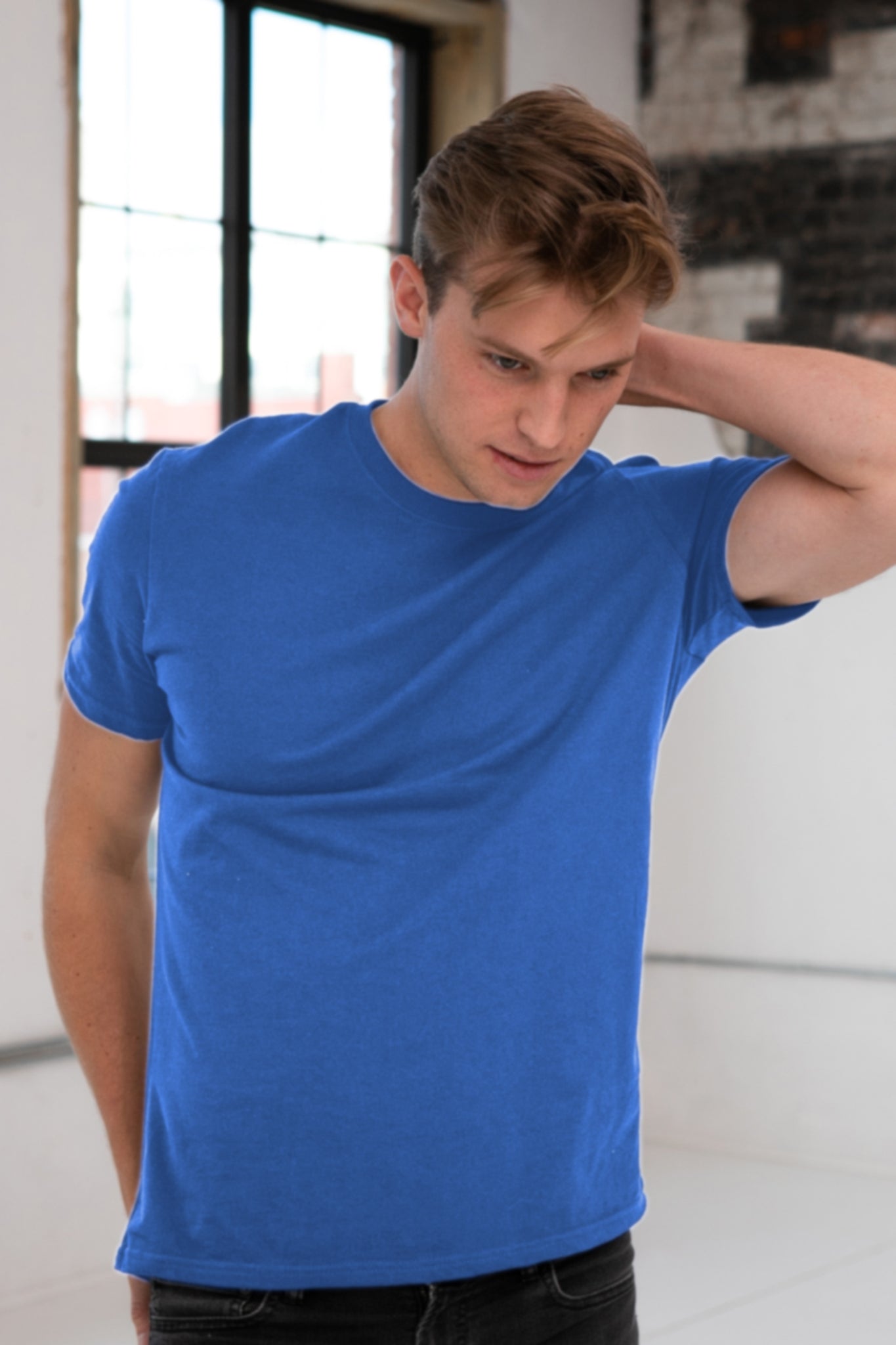 Male Model wearing GOEX Unisex and Men's Premium Cotton Tee in Royal