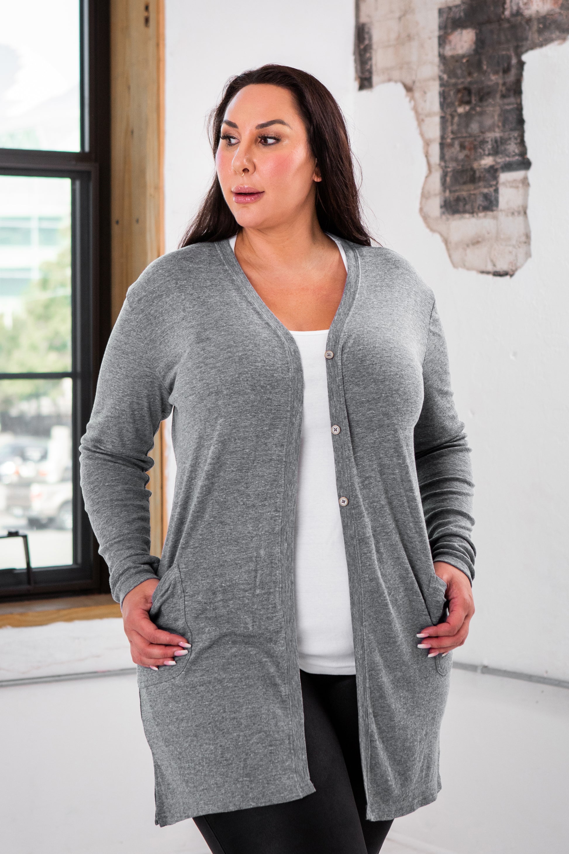 Female Model wearing GOEX Ladies Eco Triblend Rib Cardigan in Heather Grey