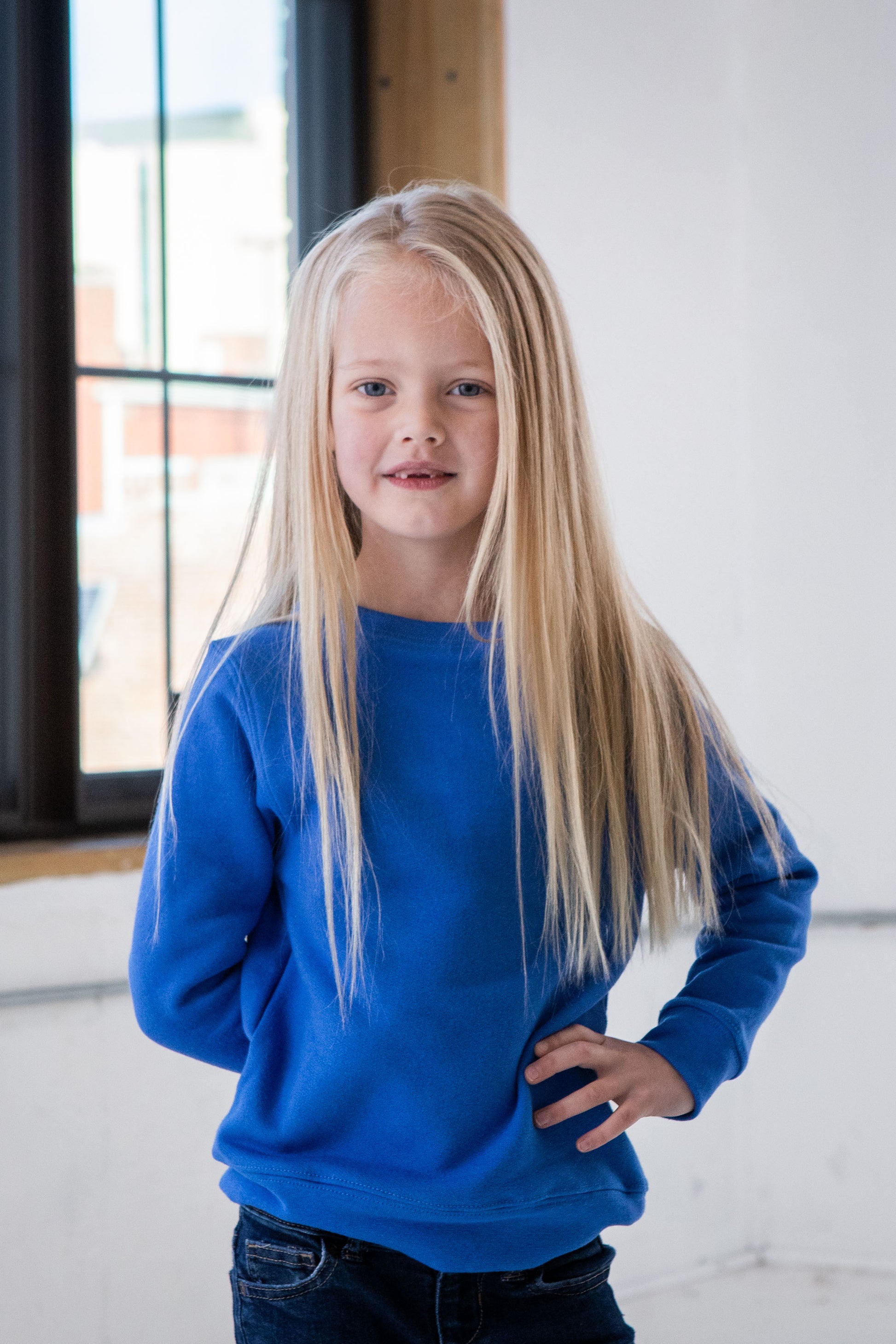 Girl Model wearing GOEX Youth Fleece Crew in Royal
