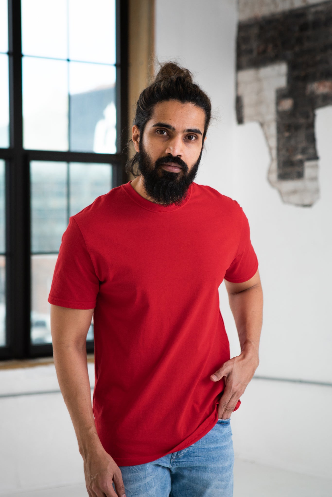 Male Model wearing GOEX Unisex and Men's Premium Cotton Tee in Red