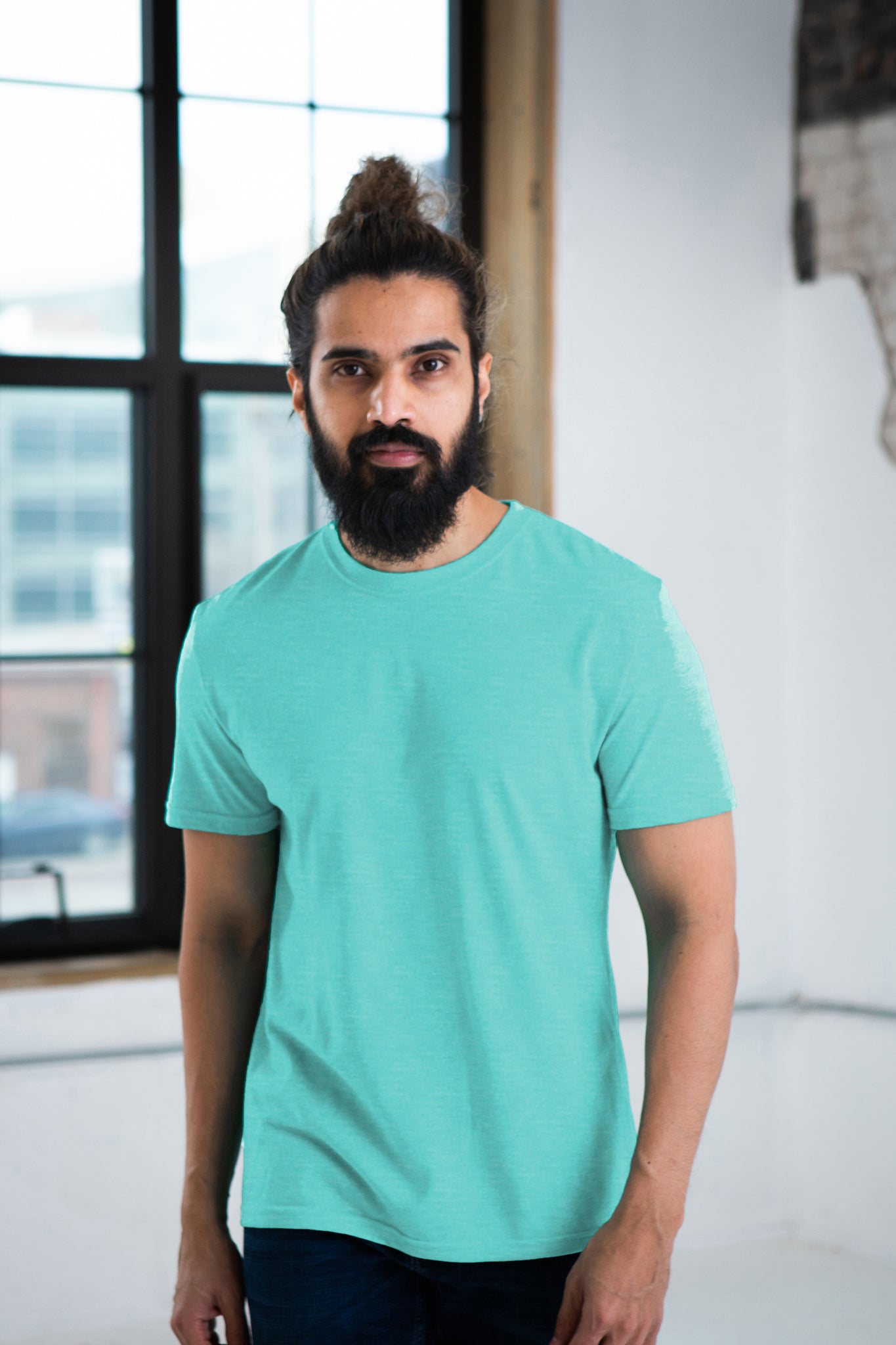 Male Model wearing GOEX Eco Triblend Unisex and Men's Tee in Teal