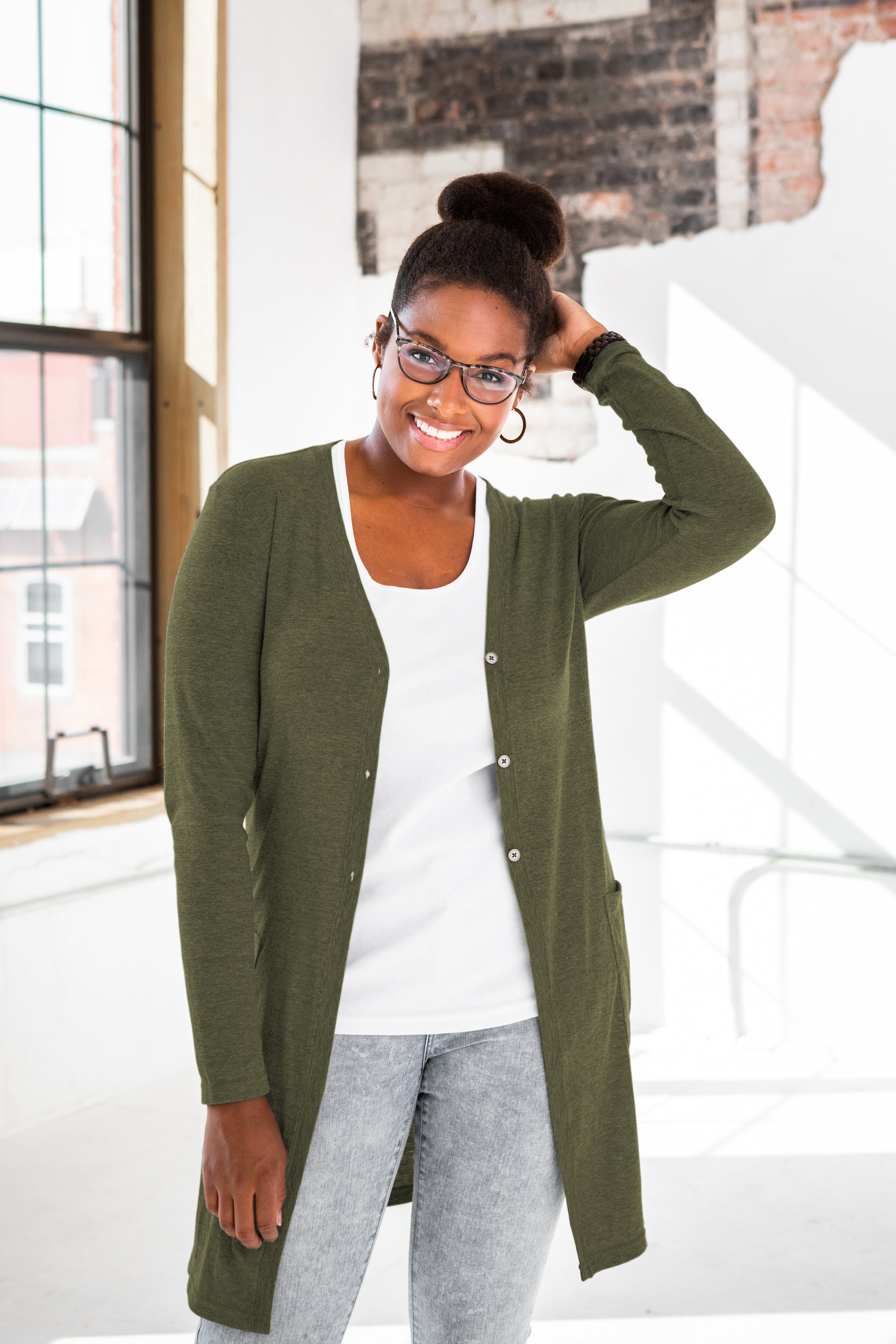 Female Model wearing GOEX Ladies Eco Triblend Rib Cardigan in Olive