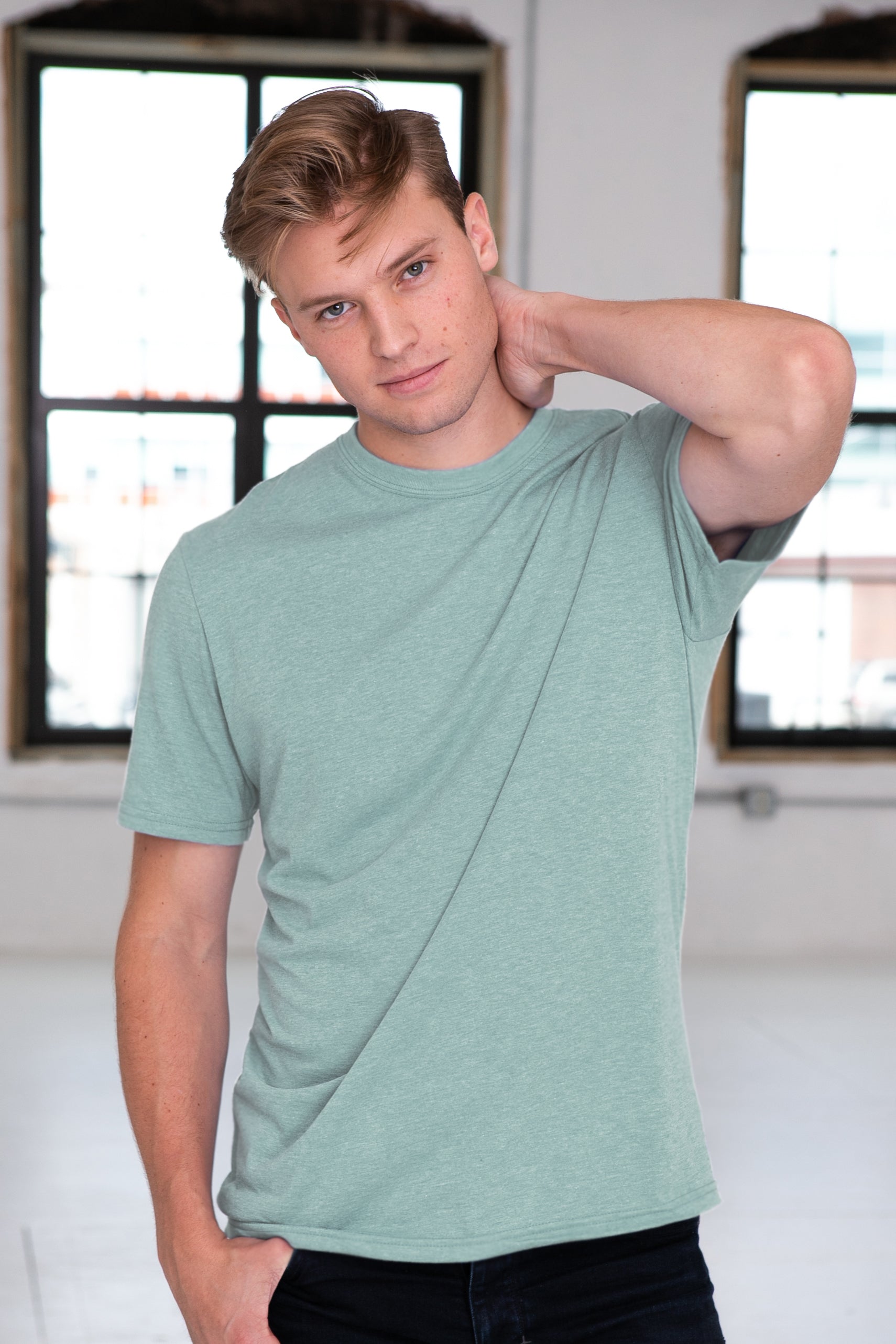 Male Model wearing GOEX Eco Triblend Unisex and Men's Tee in Sage